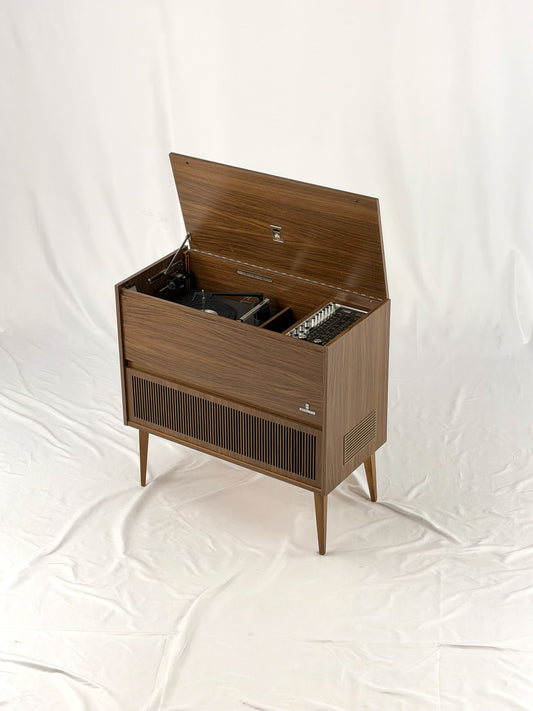 Vintage wooden stereo console on a white background