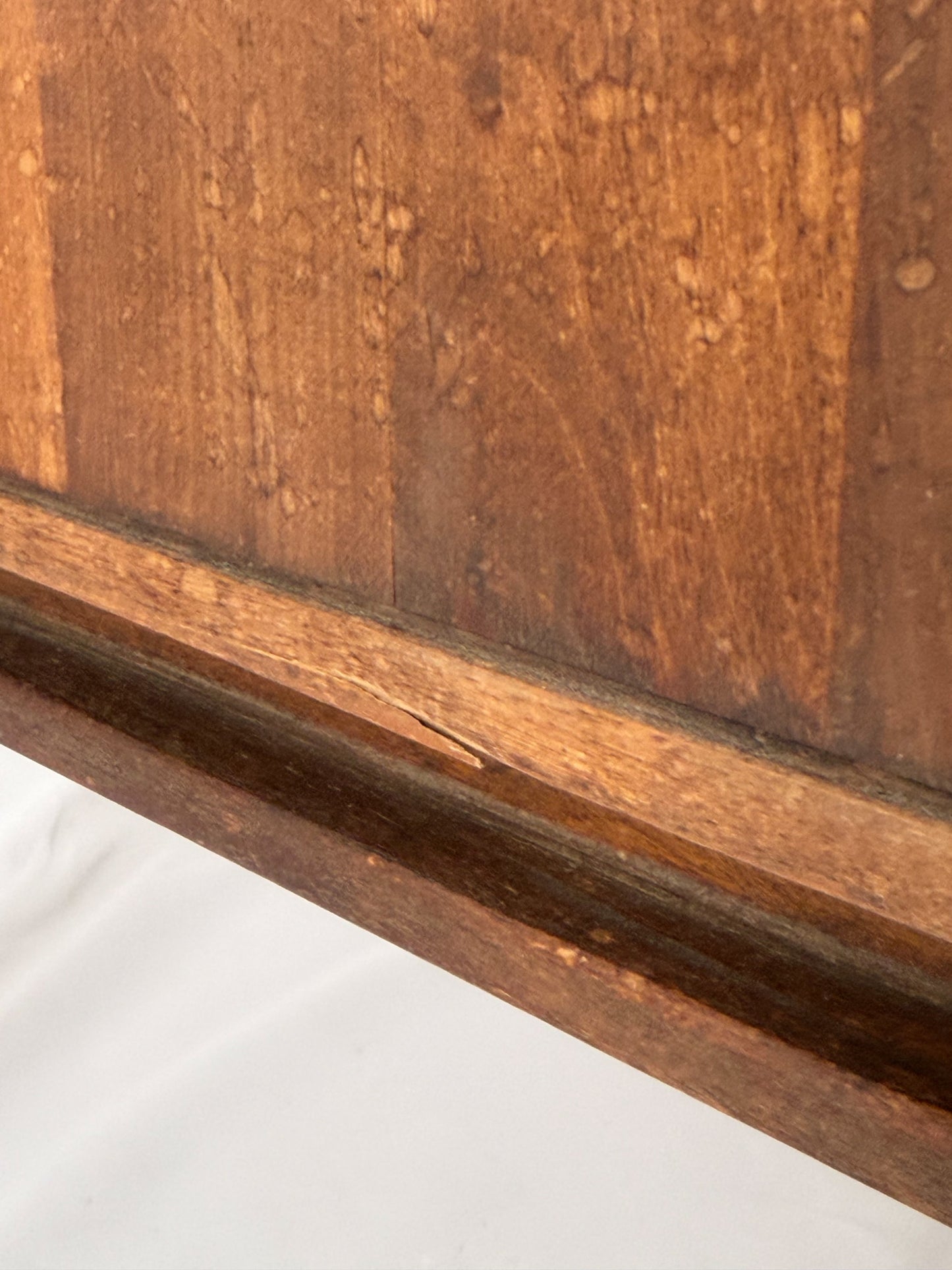 Close-up of a wooden surface with a visible grain pattern