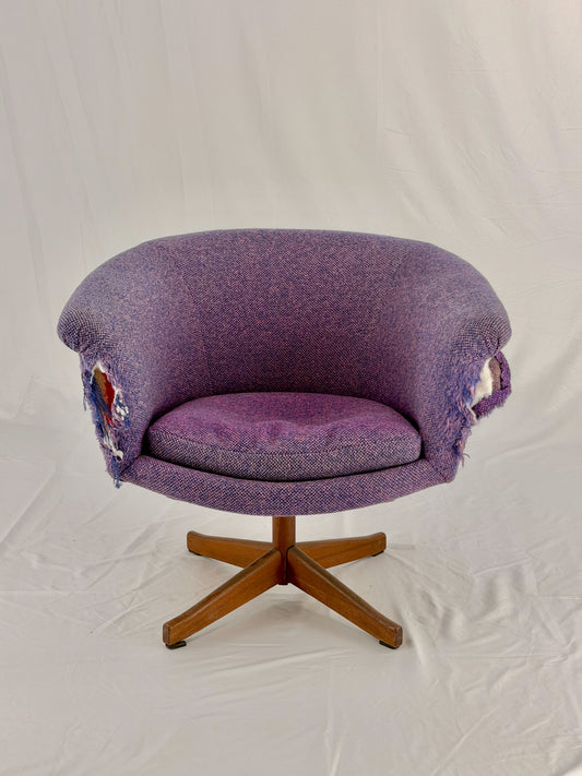 Mid Century Modern Danish pod chair with purple fabric and wooden base with a white background