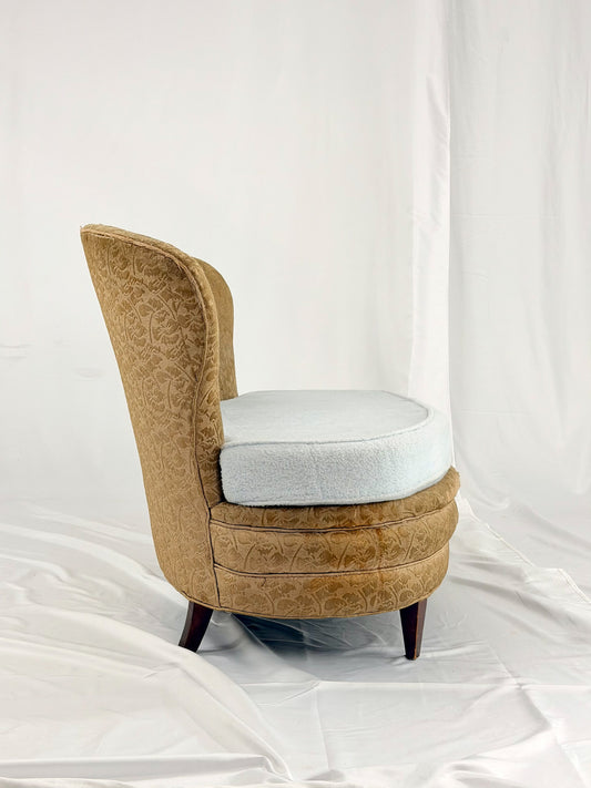 Antique settee with a light blue cushion on a white background