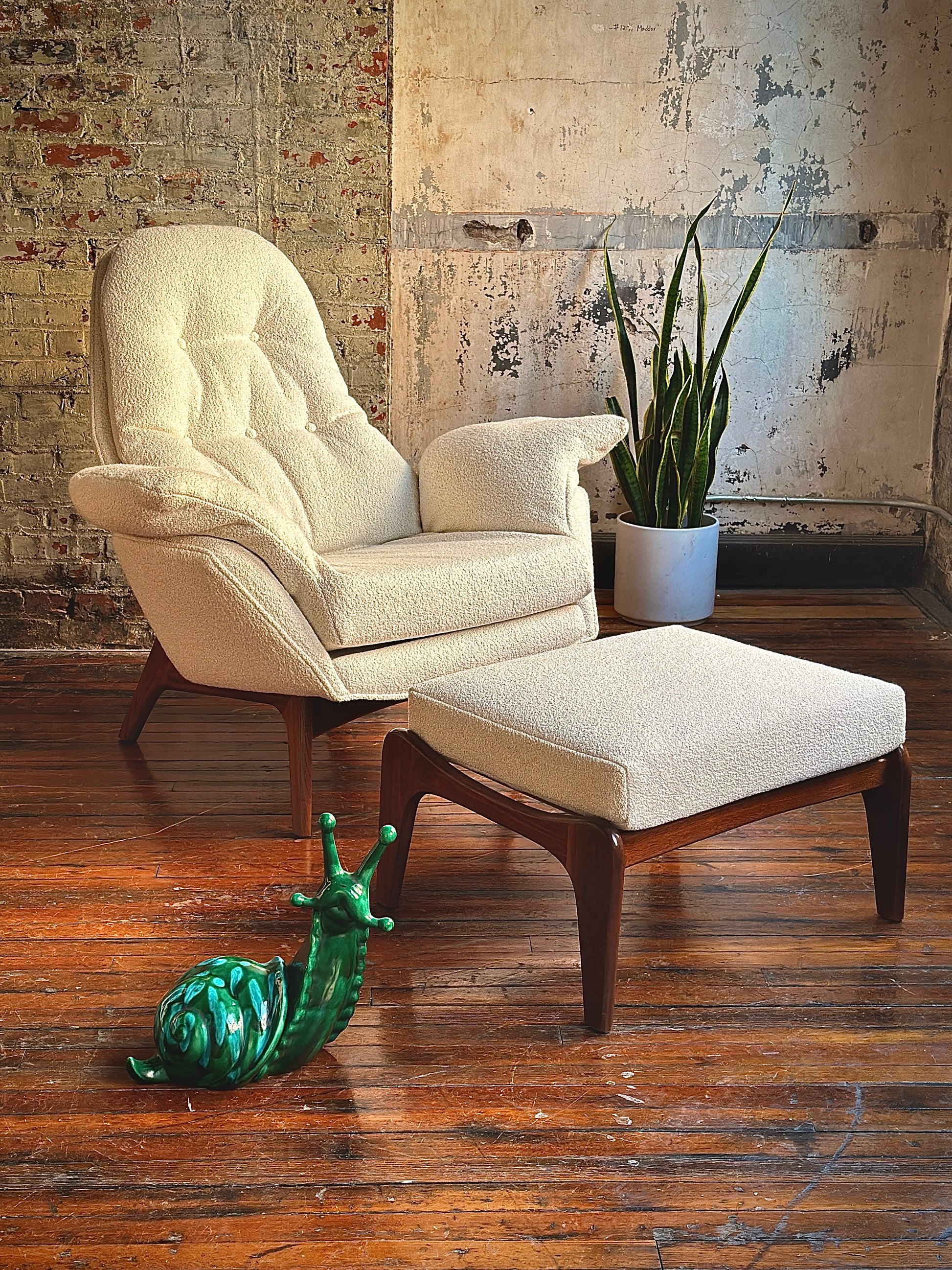 Pearsall lounge chair with walnut base.