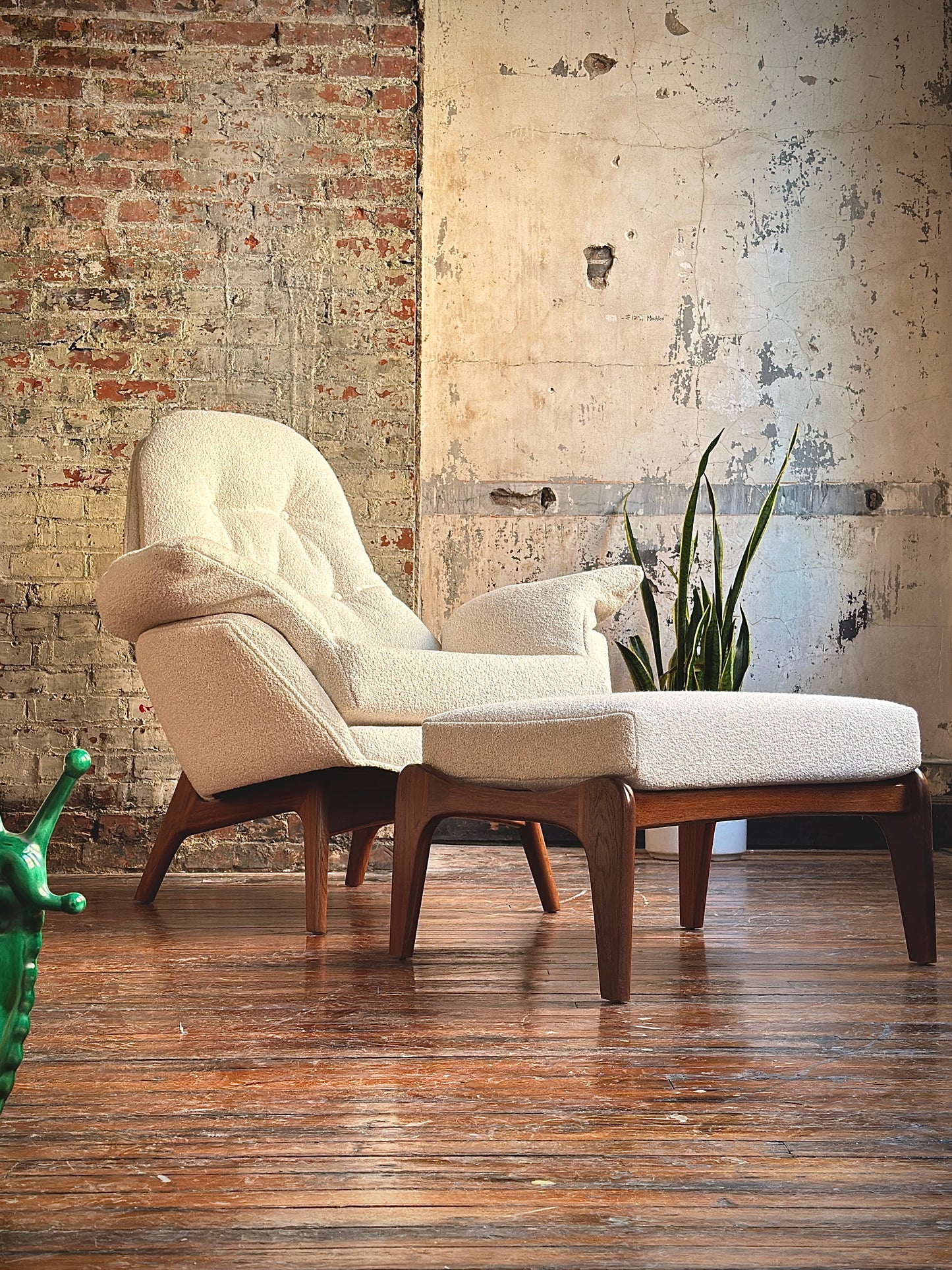 Pearsall lounge chair with walnut base.