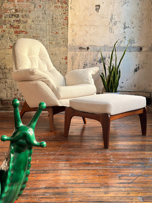 Pearsall lounge chair with walnut base.