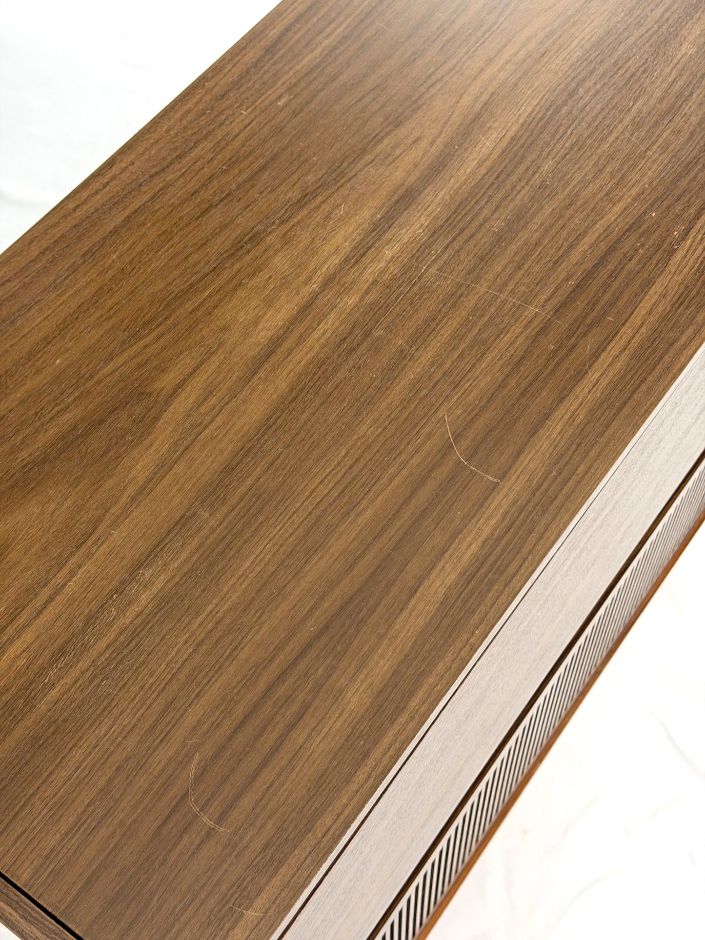 Close-up of a wooden surface with a white background