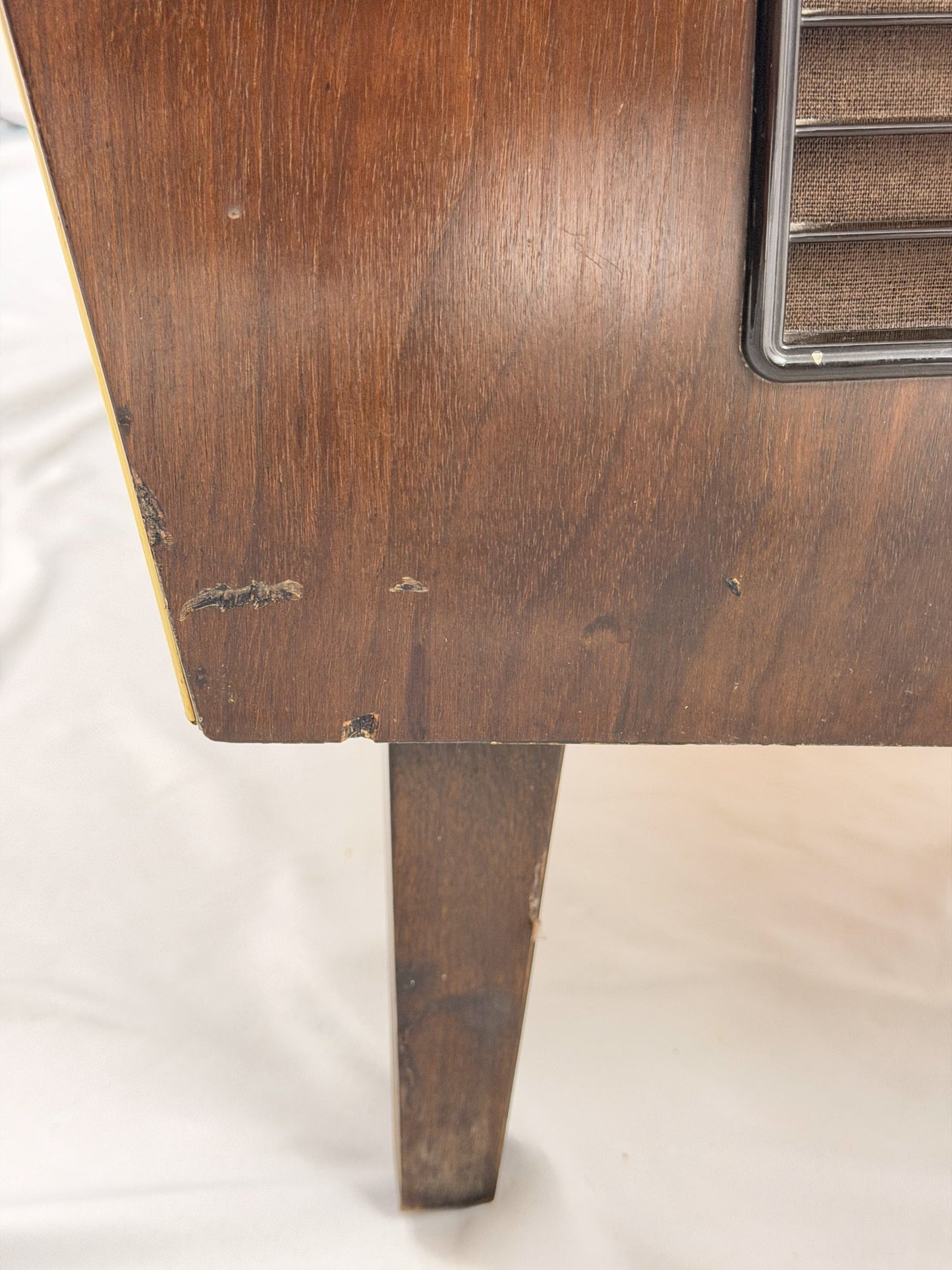 Vintage wooden stereo console on a white background