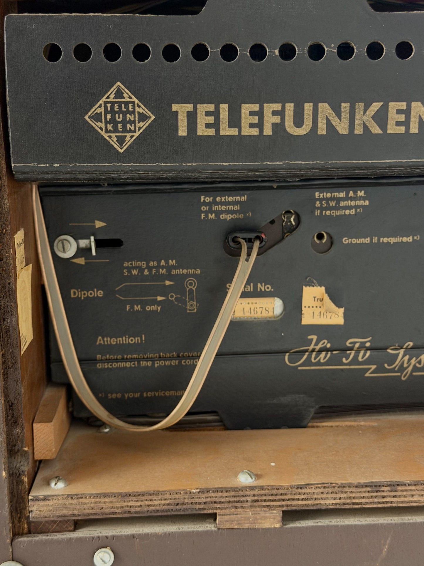 Back panel of a Telefunken radio receiver with branding and technical details.