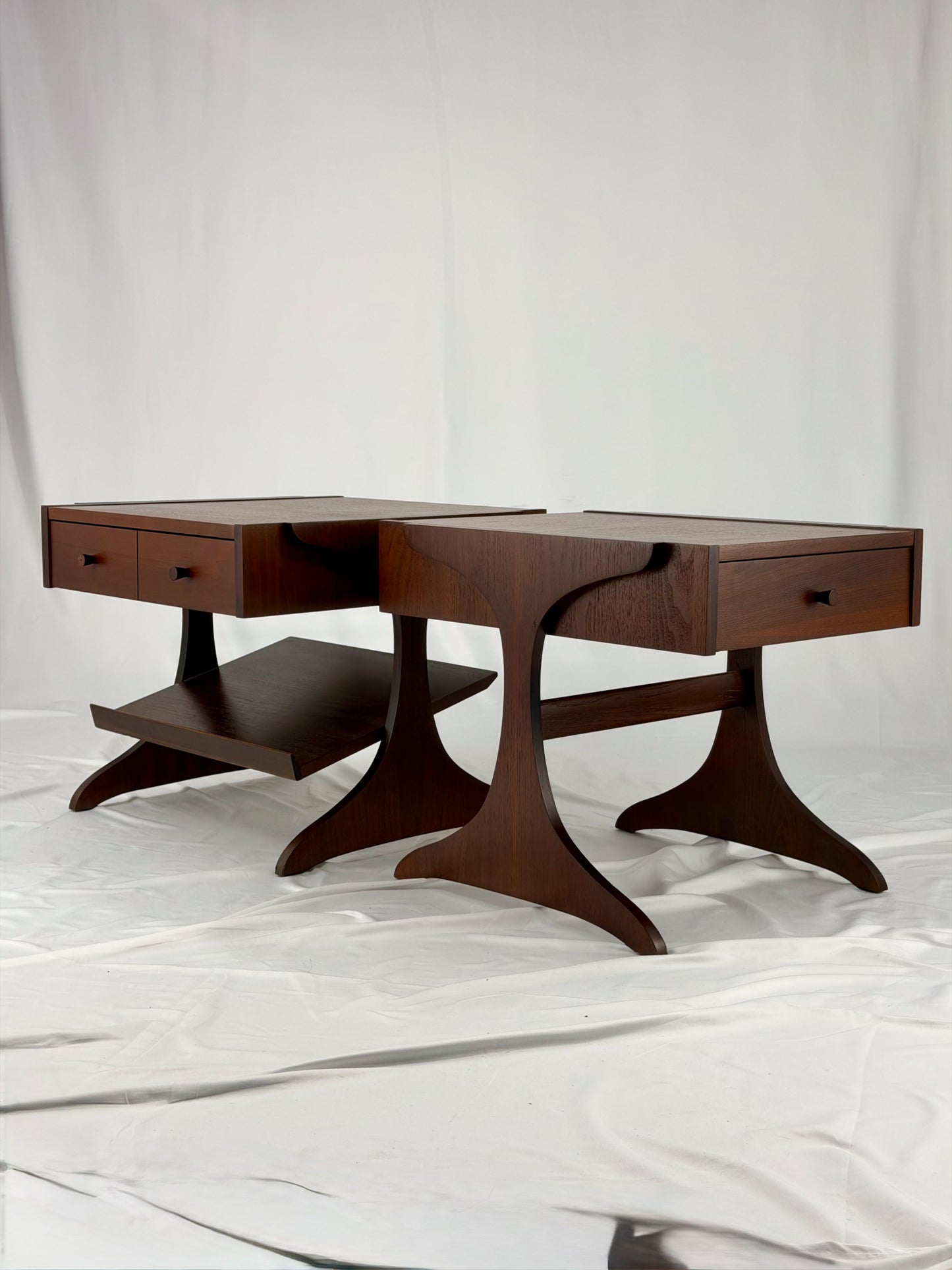 walnut end tables on a white background