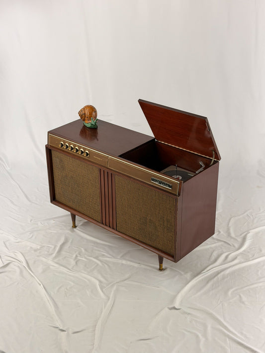 Vintage-style brown audio console on a white background