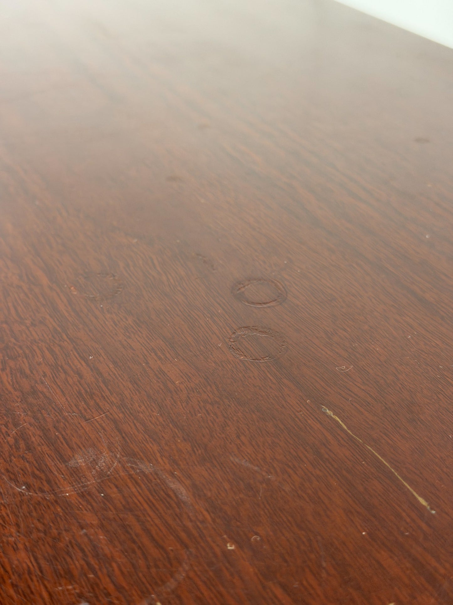 Close-up of a wooden surface with visible grain and texture