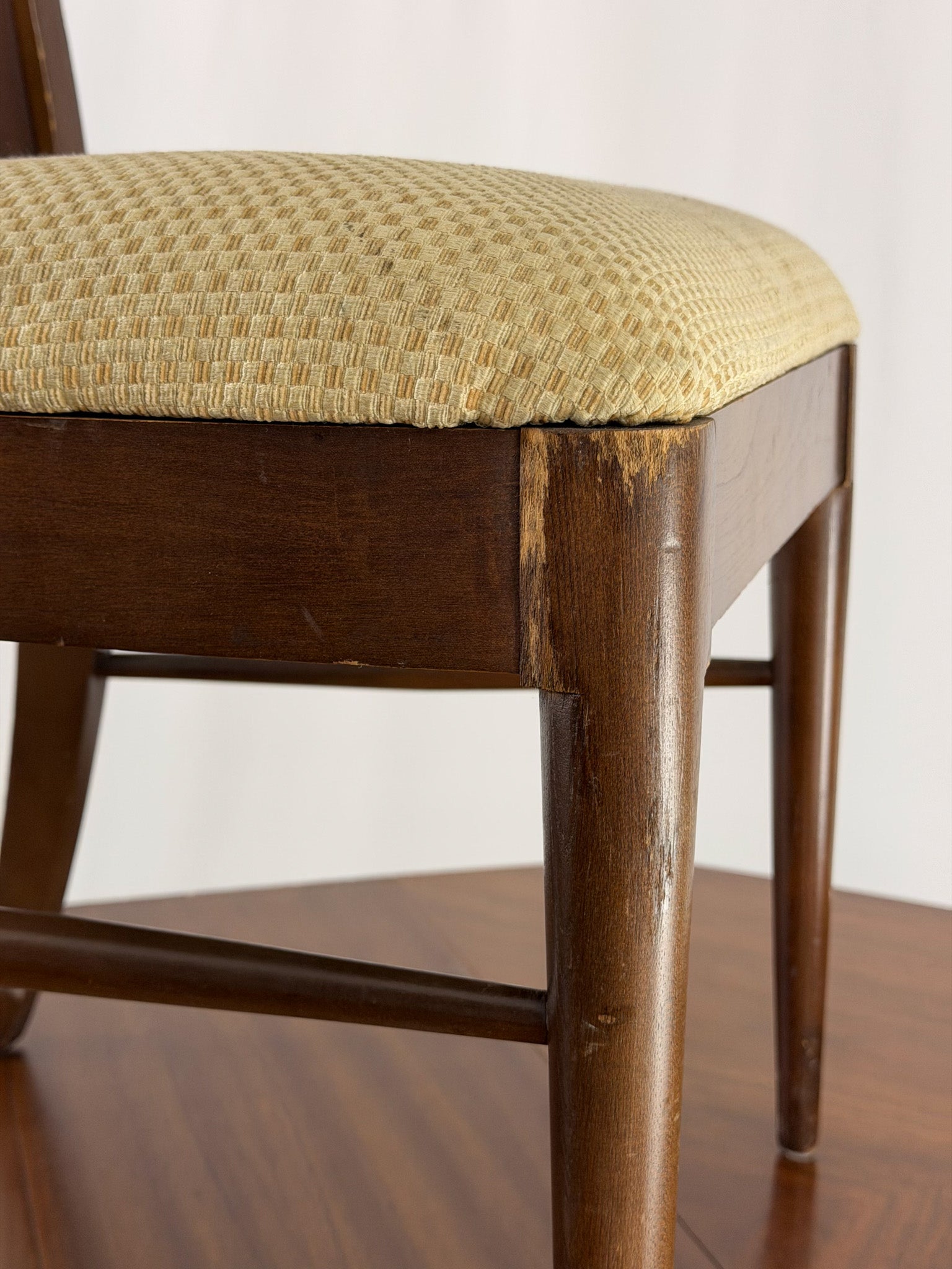 Wooden chair on  dining table  on a white background