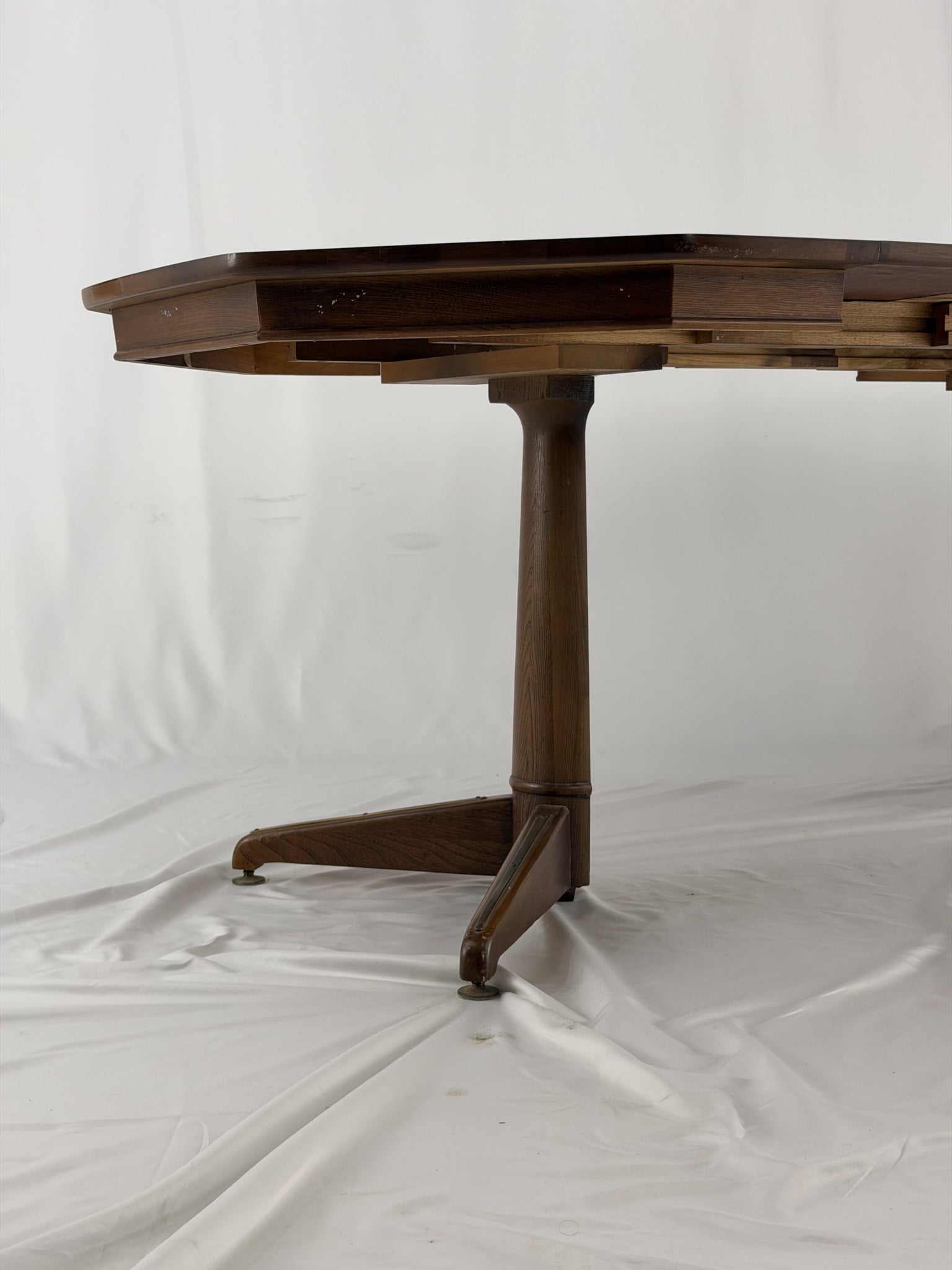 Wooden dining table on a white background