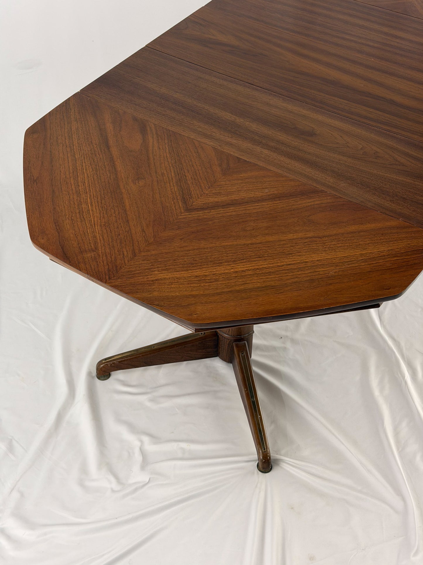Wooden table with a geometric design on a white background