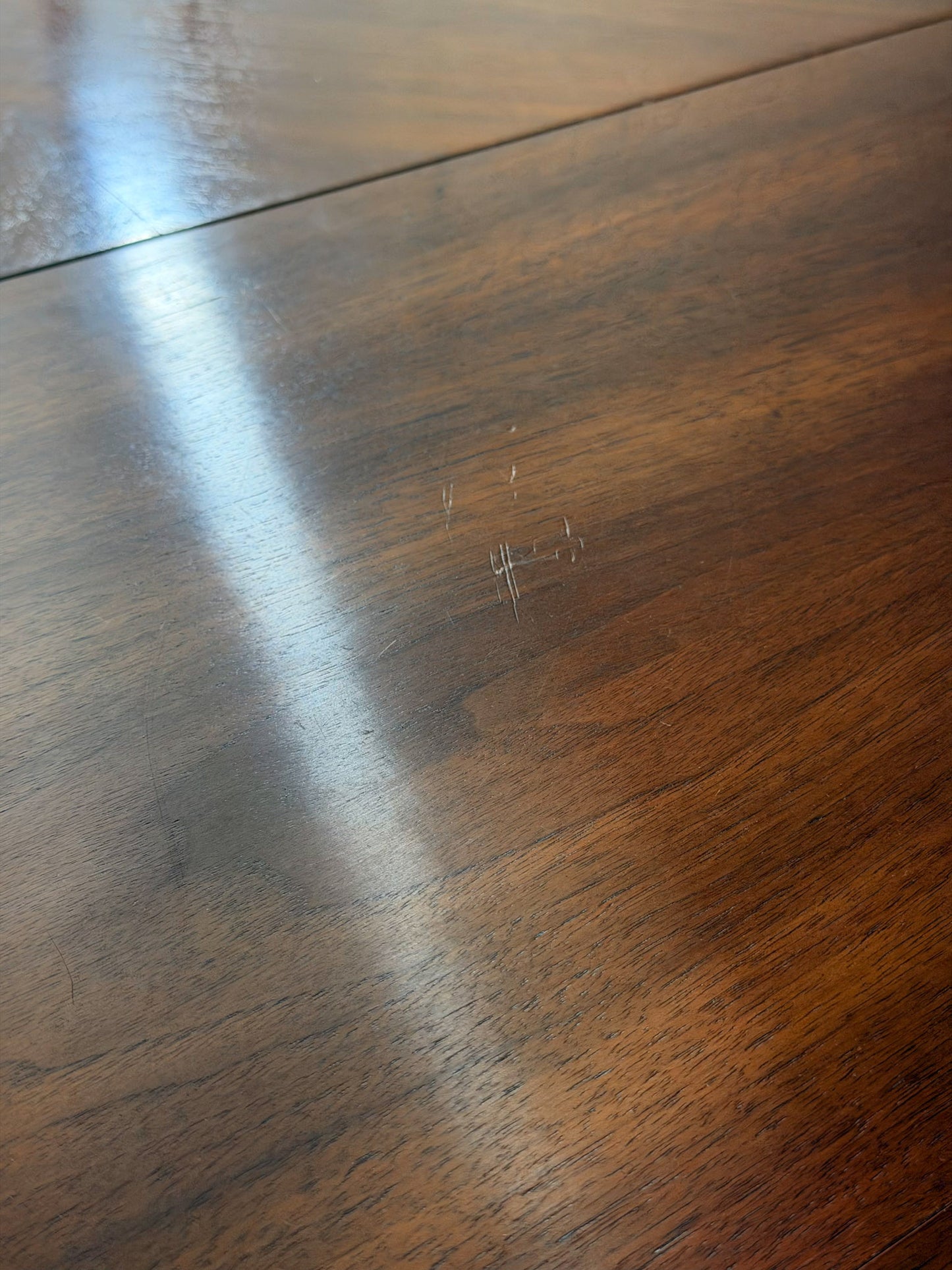 Close-up of a wooden surface with a visible grain pattern