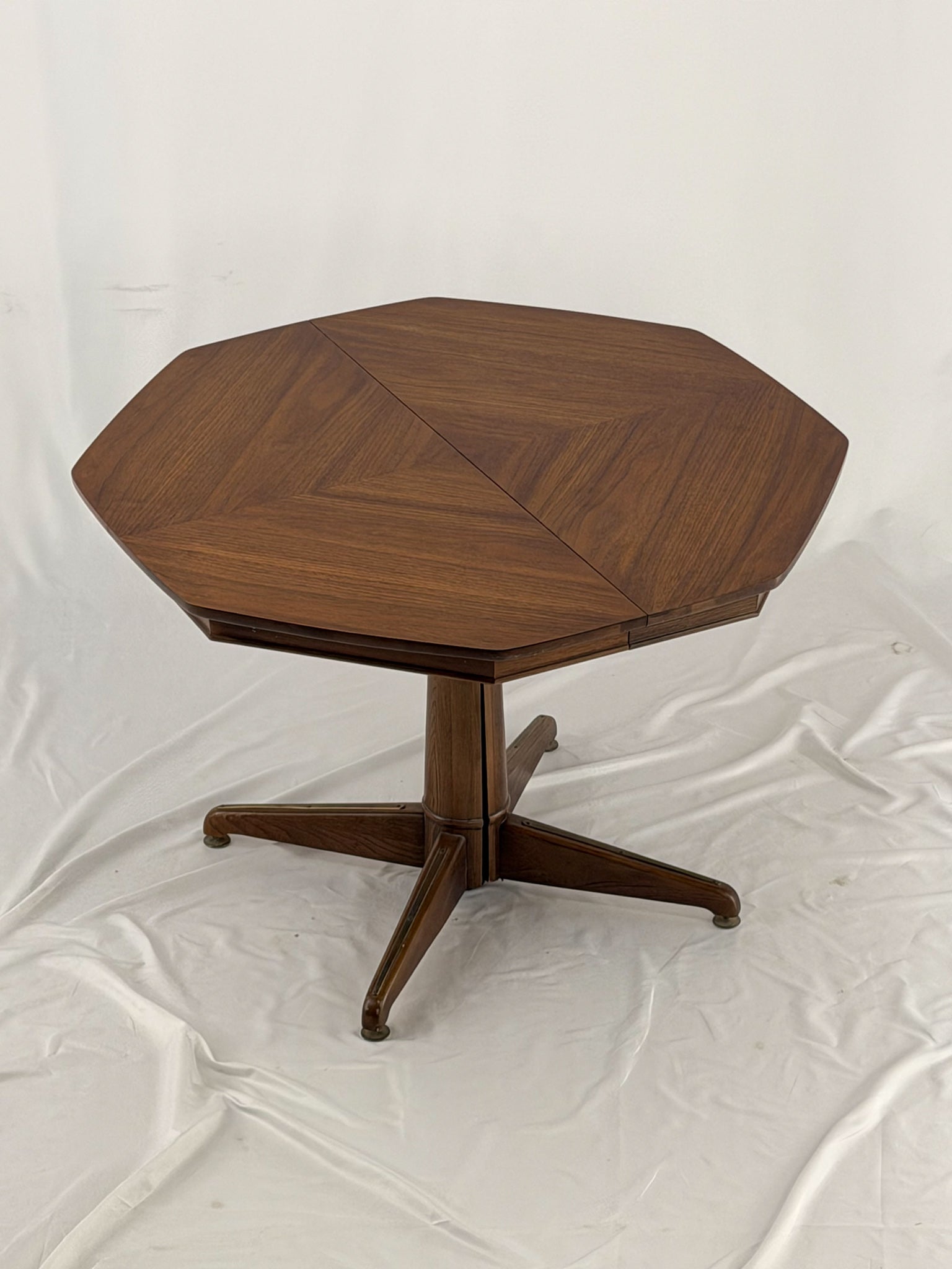 Wooden octagonal table on a white background