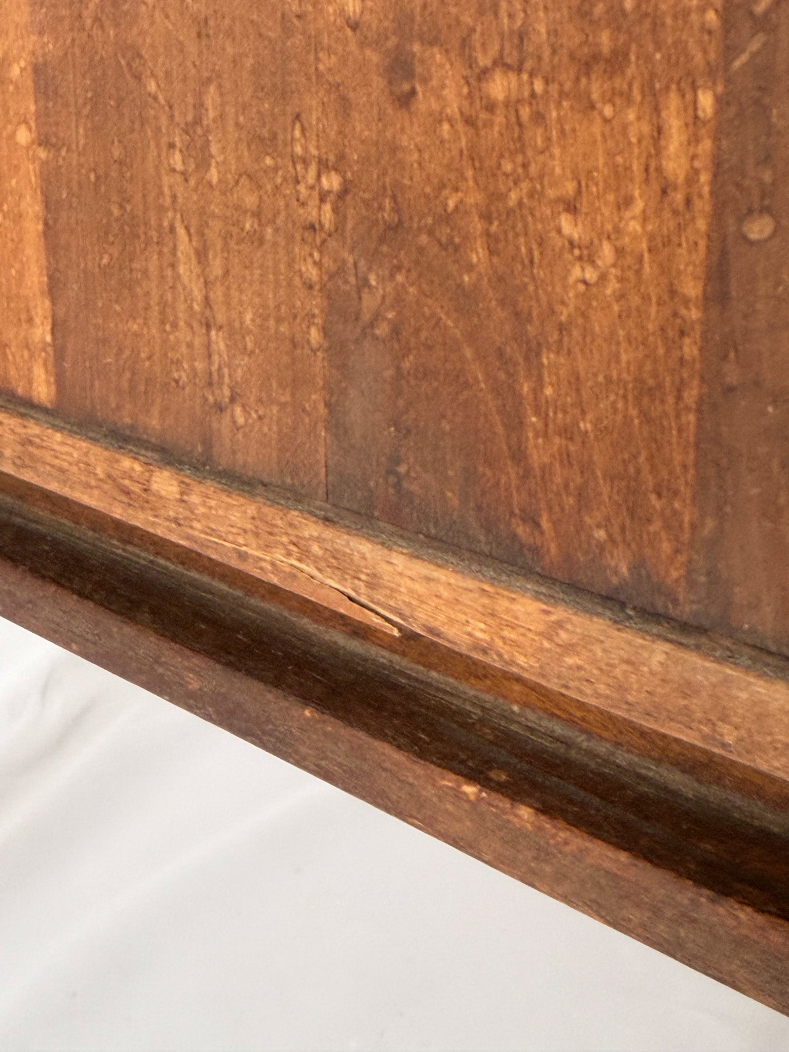 Close-up of a wooden surface with a visible grain pattern
