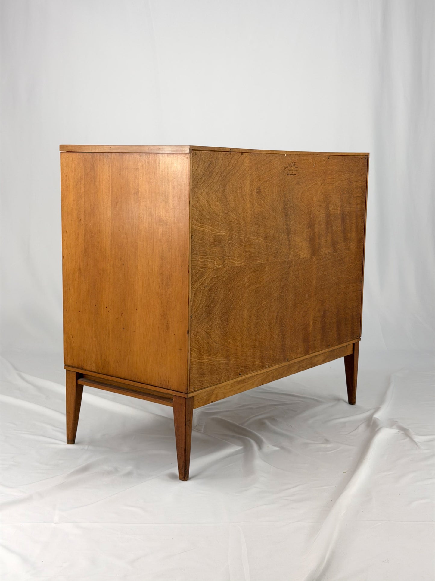 Wooden cabinet on a white background