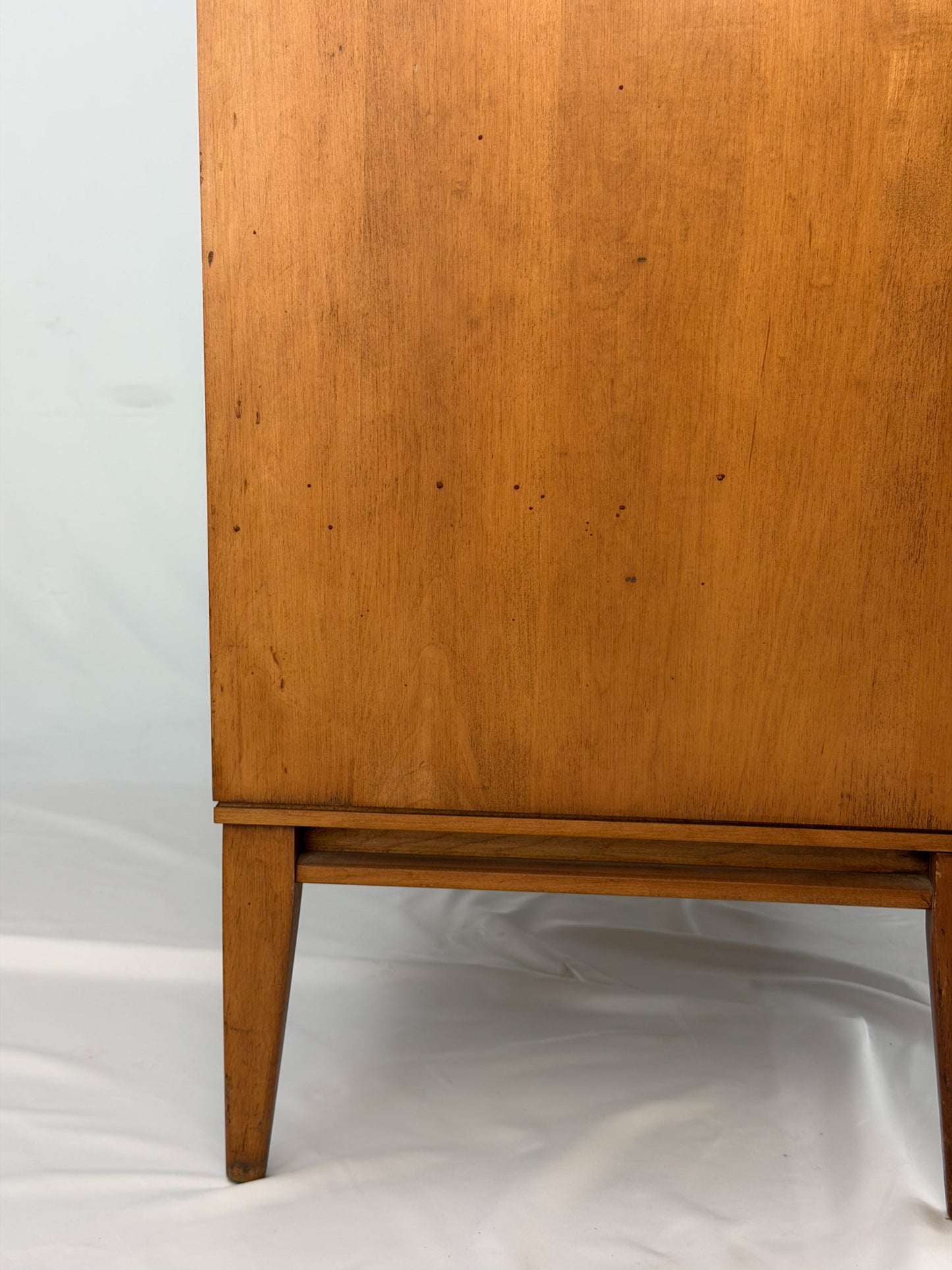 Wooden cabinet on a white background