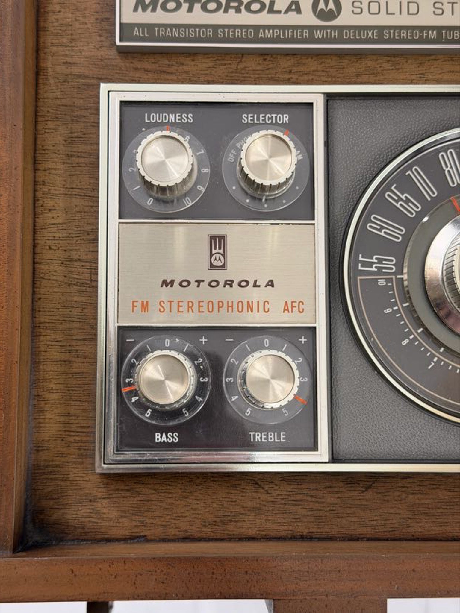 Vintage Motorola radio receiver with wooden casing