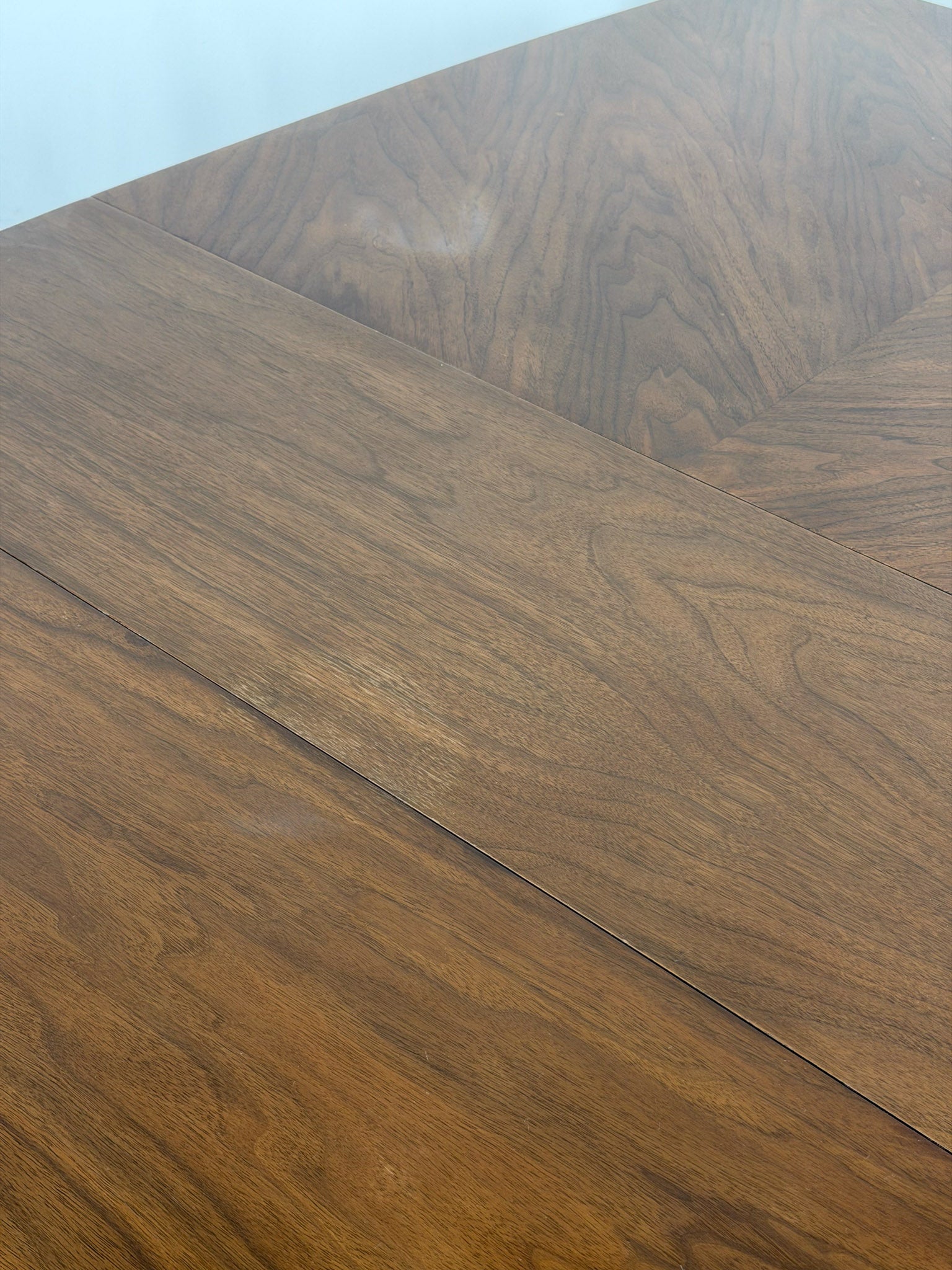 Close-up of a wooden surface with visible grain and texture