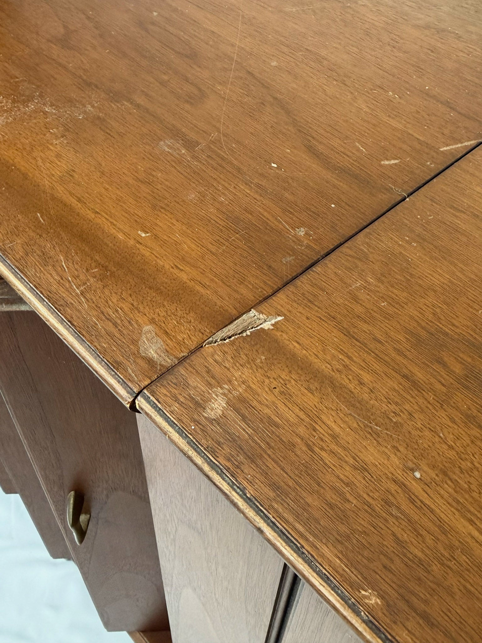 Wooden table with a visible crack in the surface