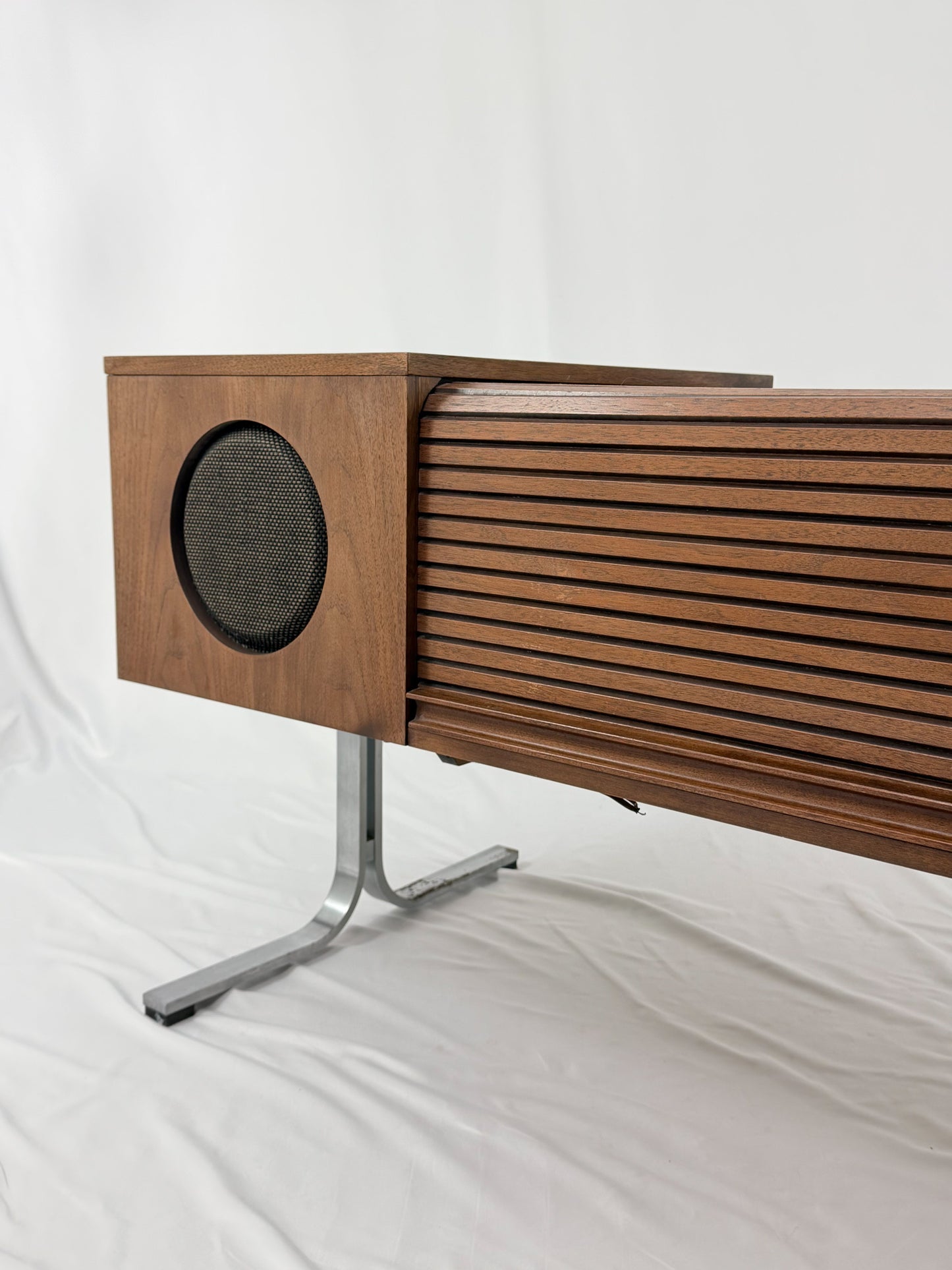 Electrohome vintage wooden stereo console with speakers on a white background