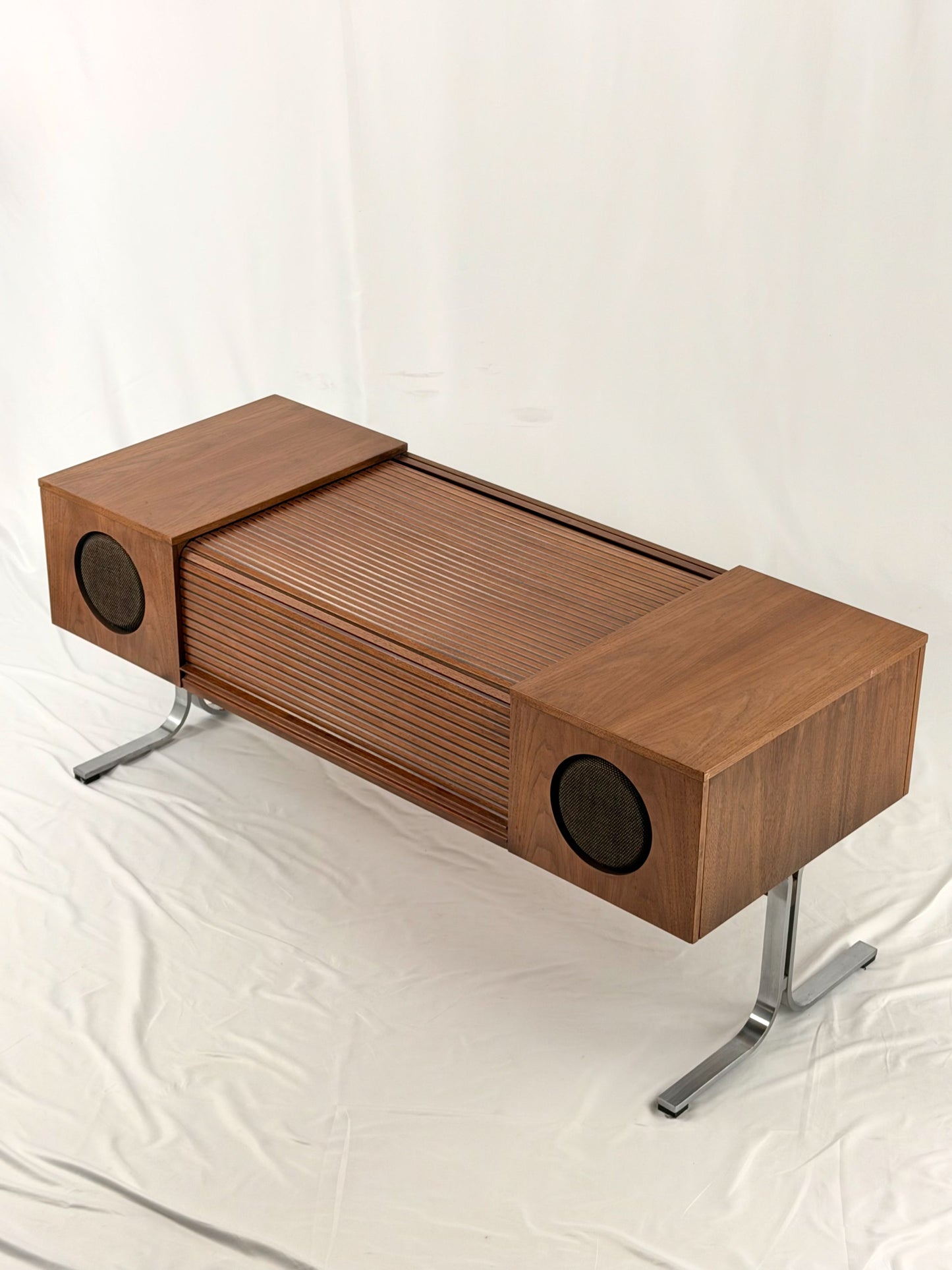 Electrohome vintage wooden stereo console with speakers on a white background
