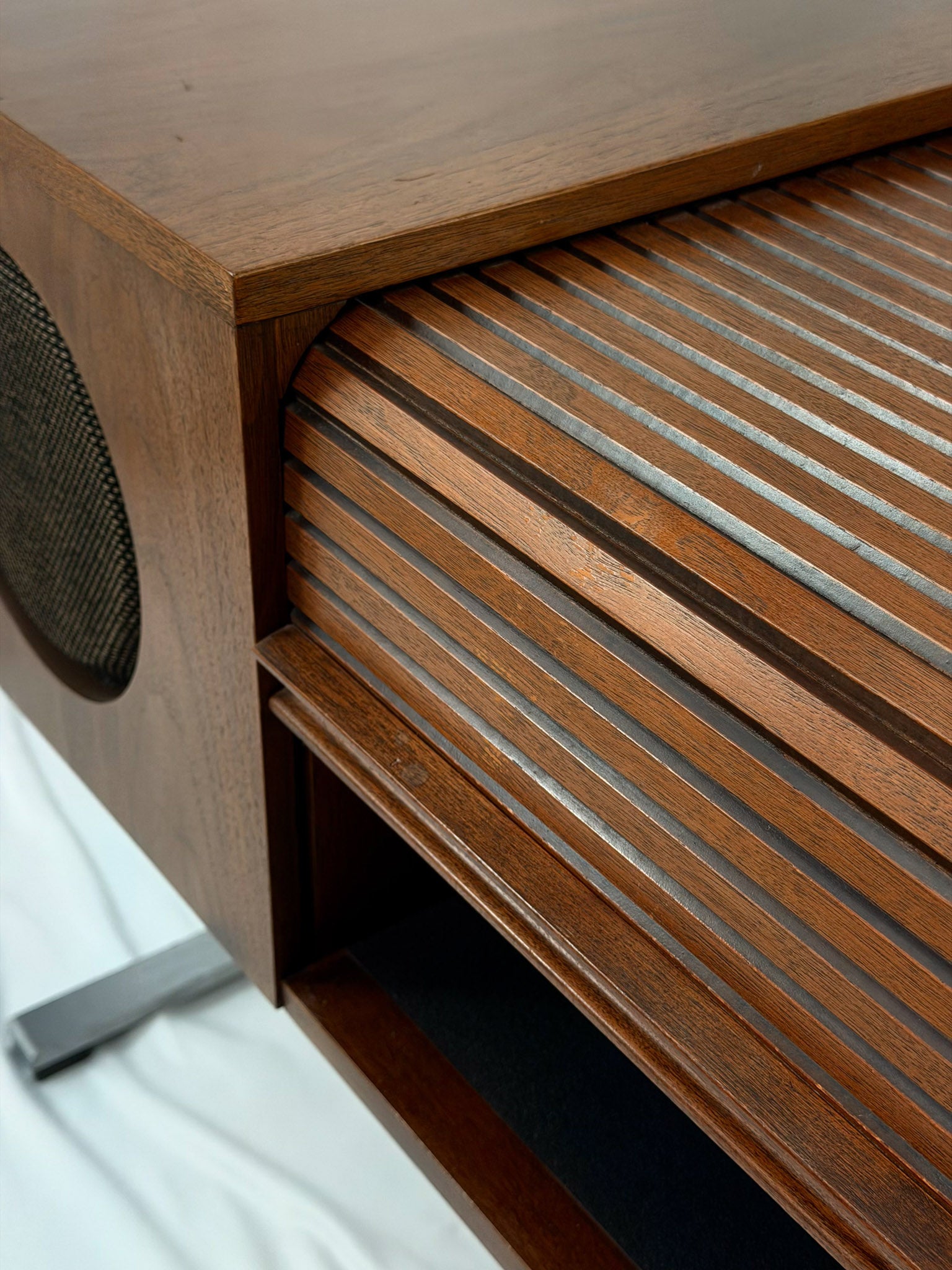 Electrohome vintage wooden stereo console with speakers on a white background