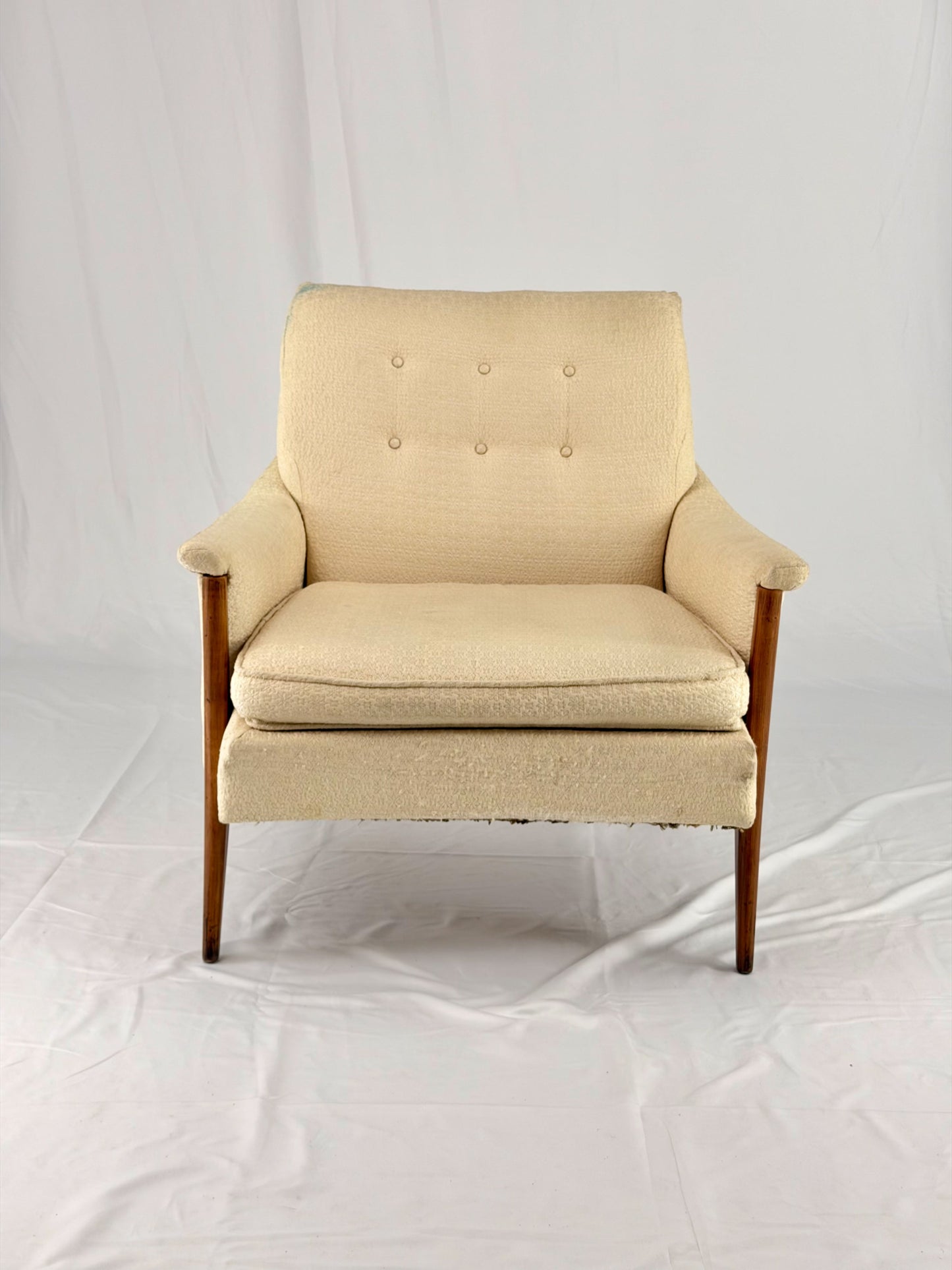 Beige armchair on a white background