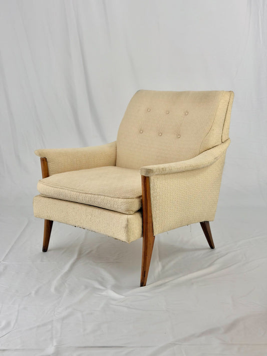 Beige armchair on a white background