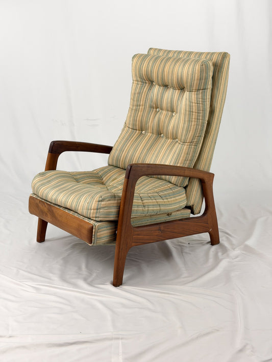 Vintage Adrian Pearsall armchair with striped cushion on a white background