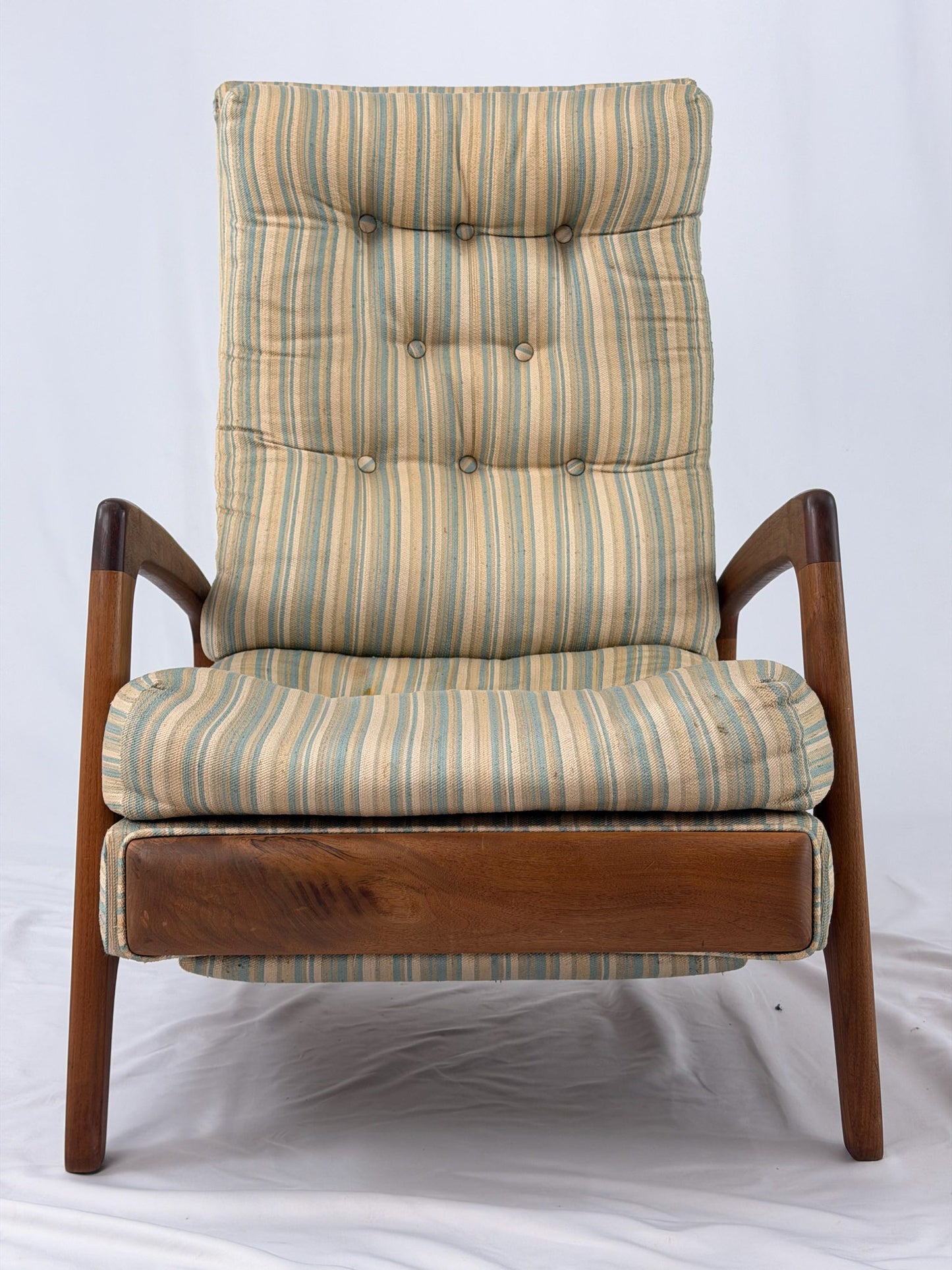Vintage Adrian Pearsall recliner with striped cushion on a white background