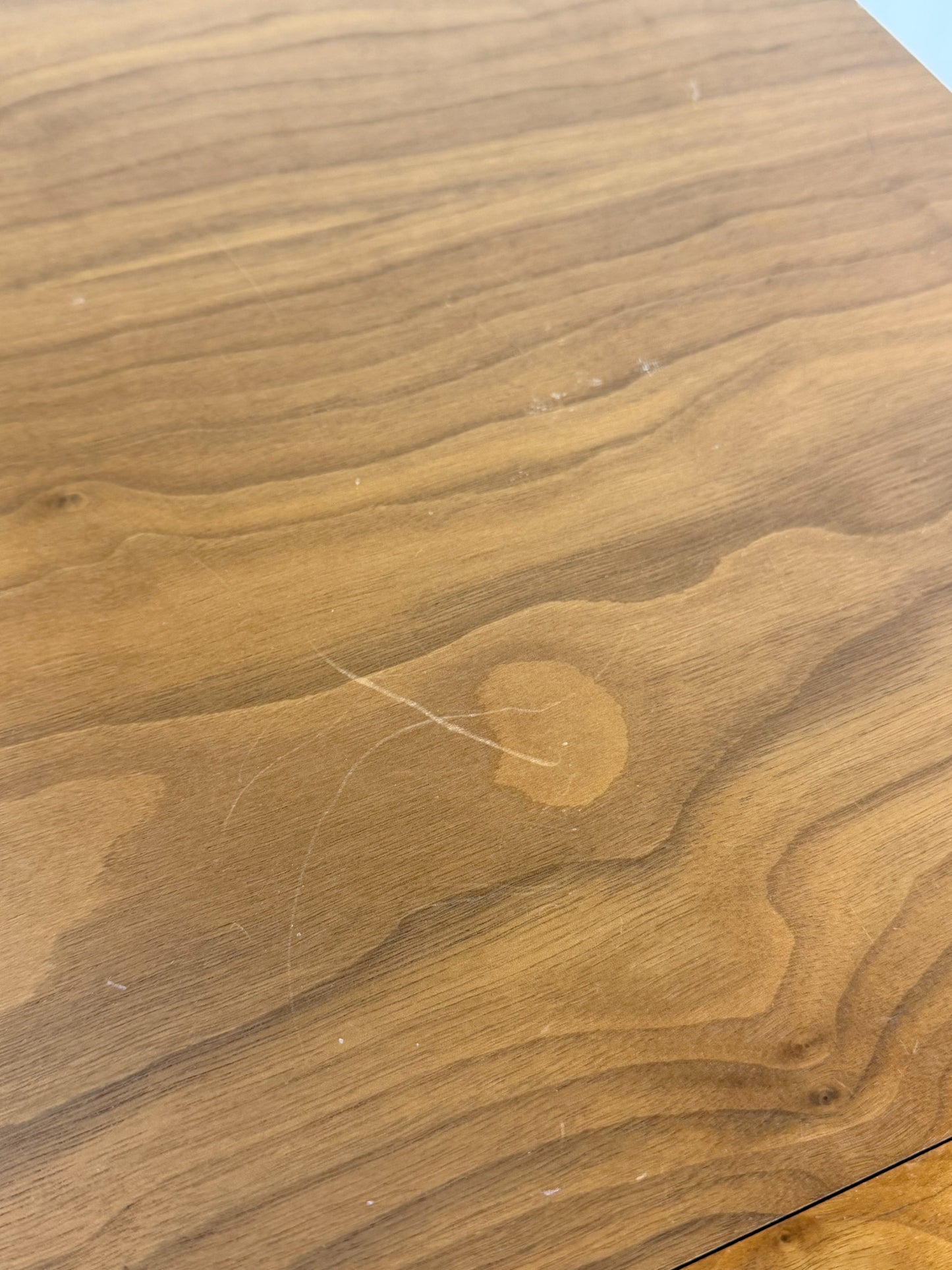 Close-up of a wooden surface with visible grain and texture