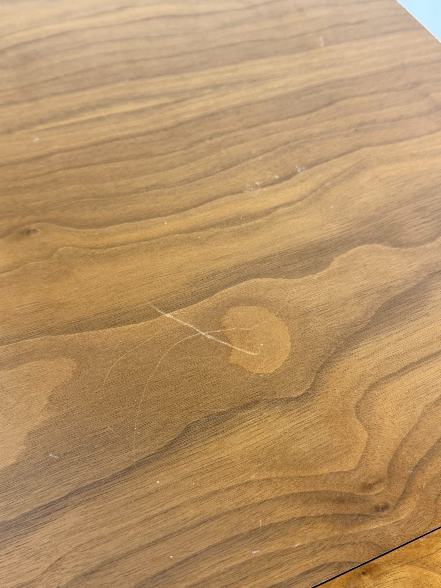 Close-up of a wooden surface with visible grain and texture