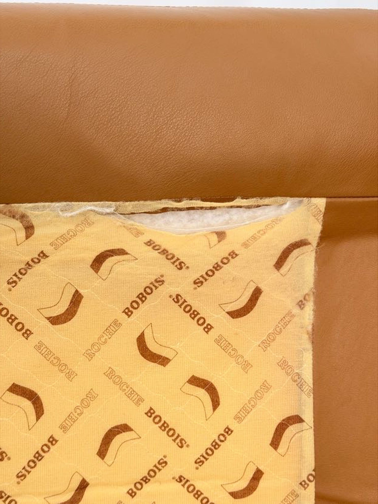 Brown leather fabric with BOBOIS branding on a white background