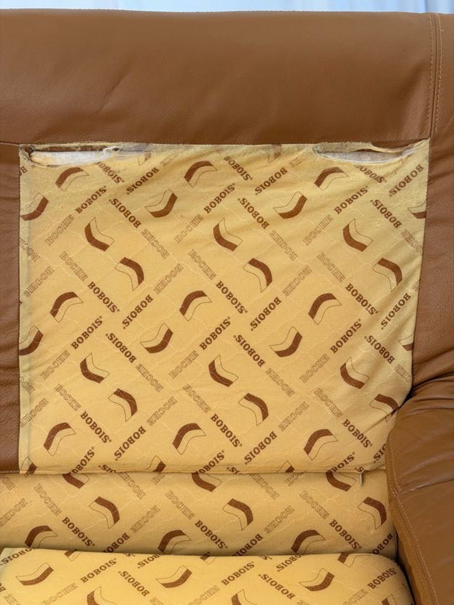 Brown leather fabric with BOBOIS branding on a white background