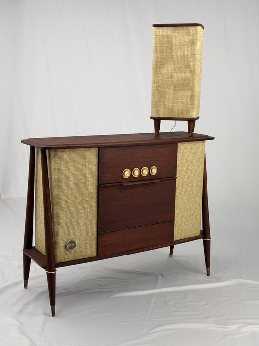 Wooden console with speaker on a white background