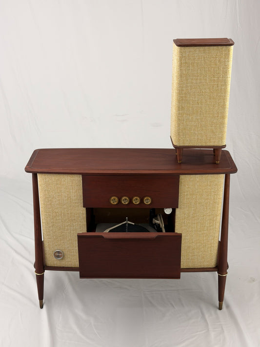 Vintage-style wooden console with beige textured panels on a white background