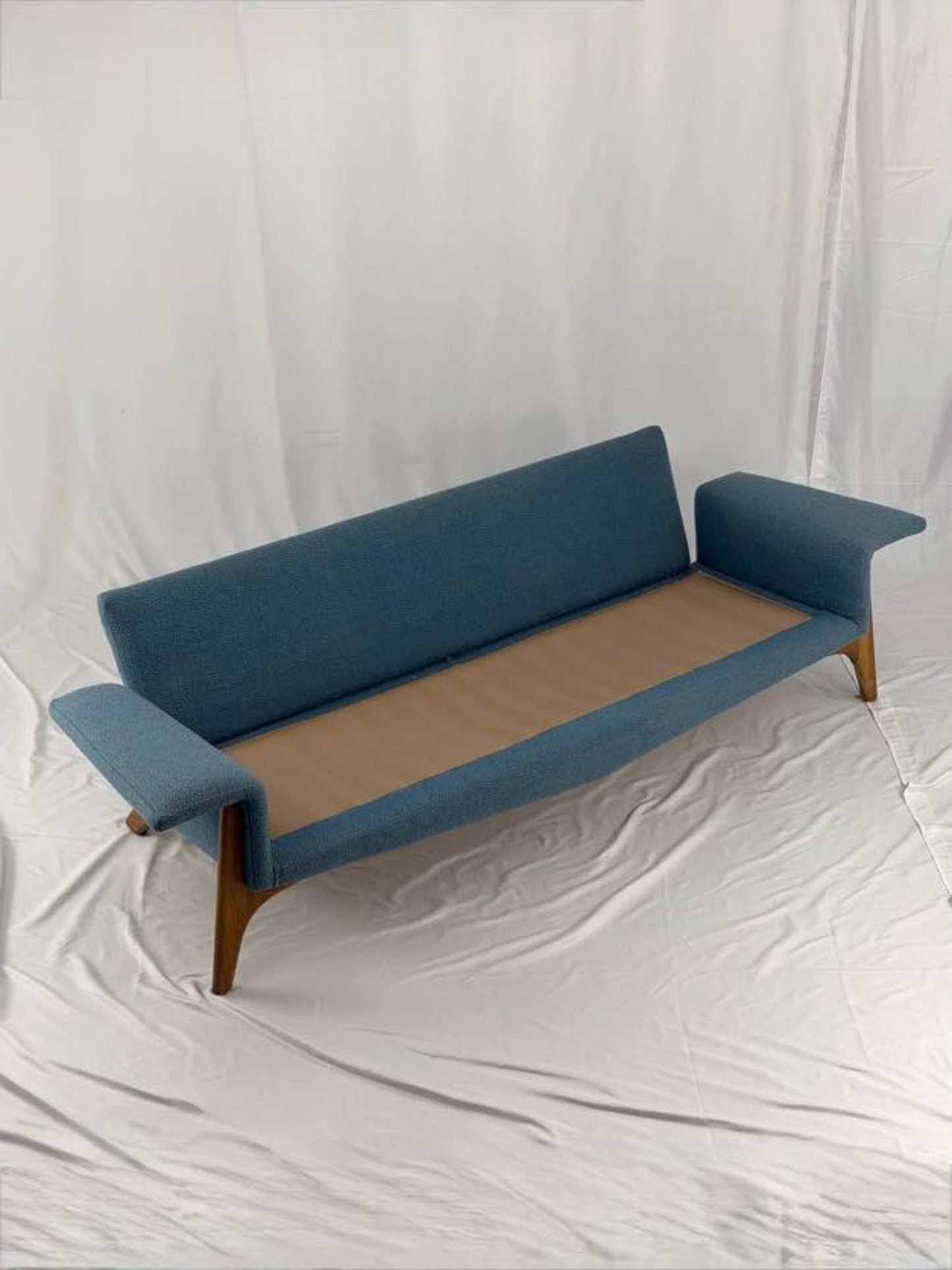 Blue sofa on a white background