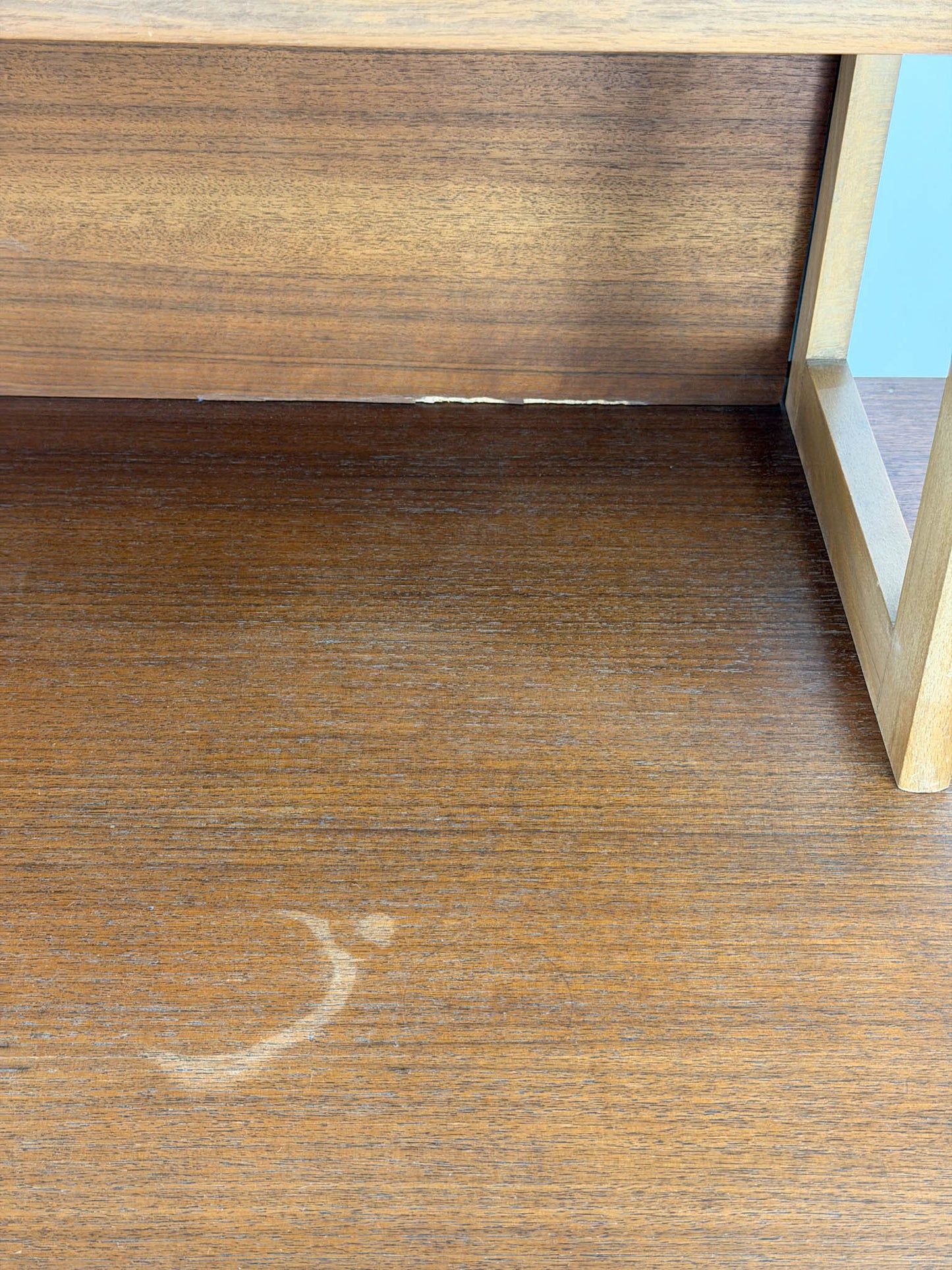 Wooden surface with a visible stain or mark