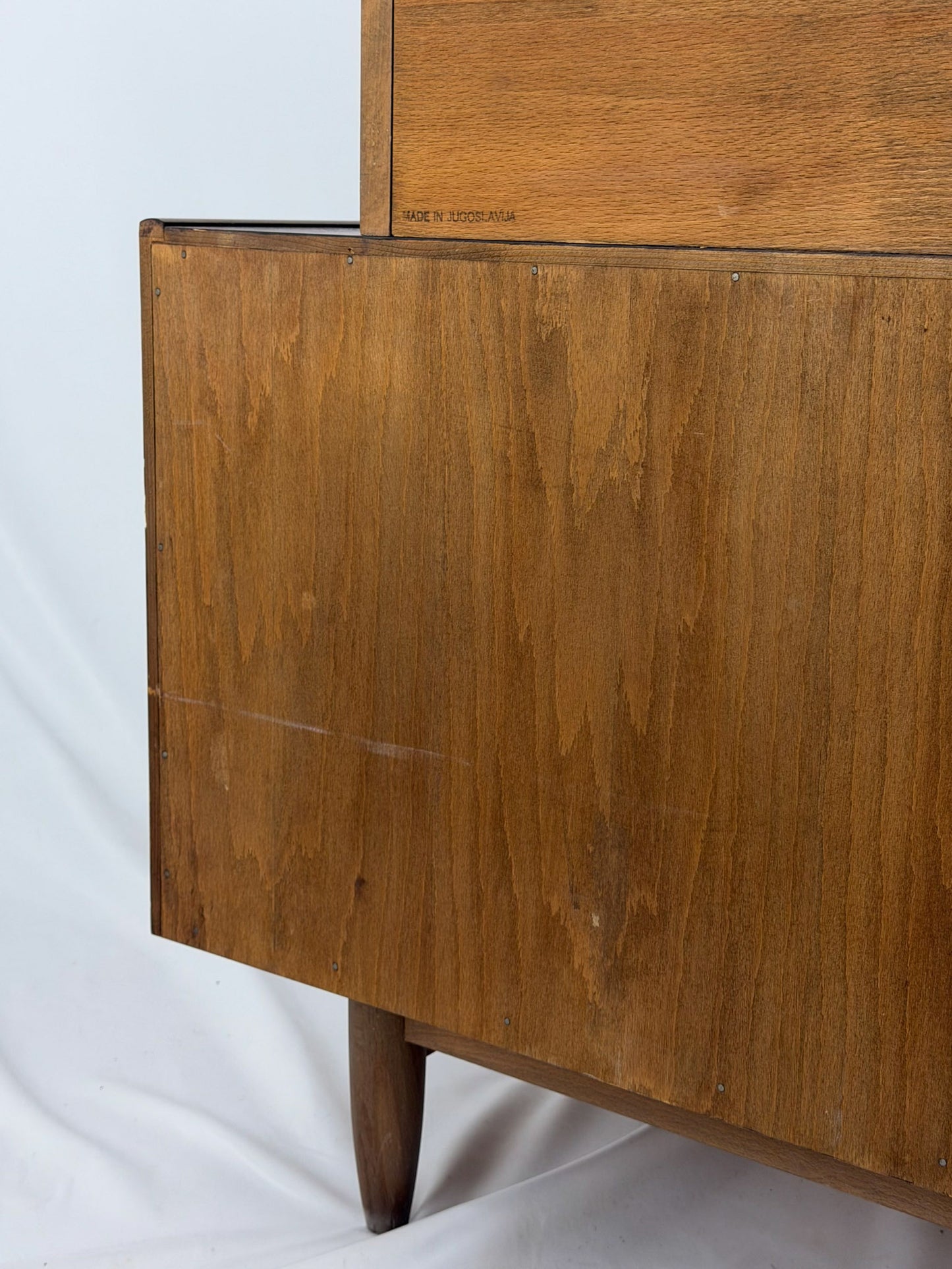 Wooden cabinet with a white background