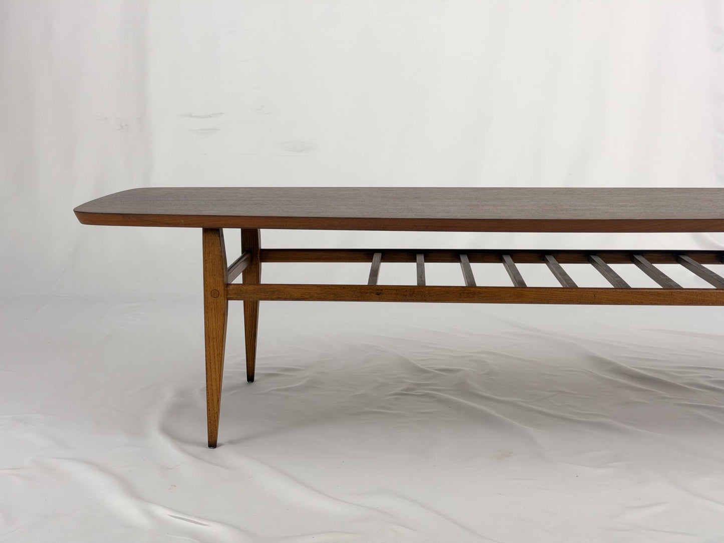Wooden coffee table on a white background