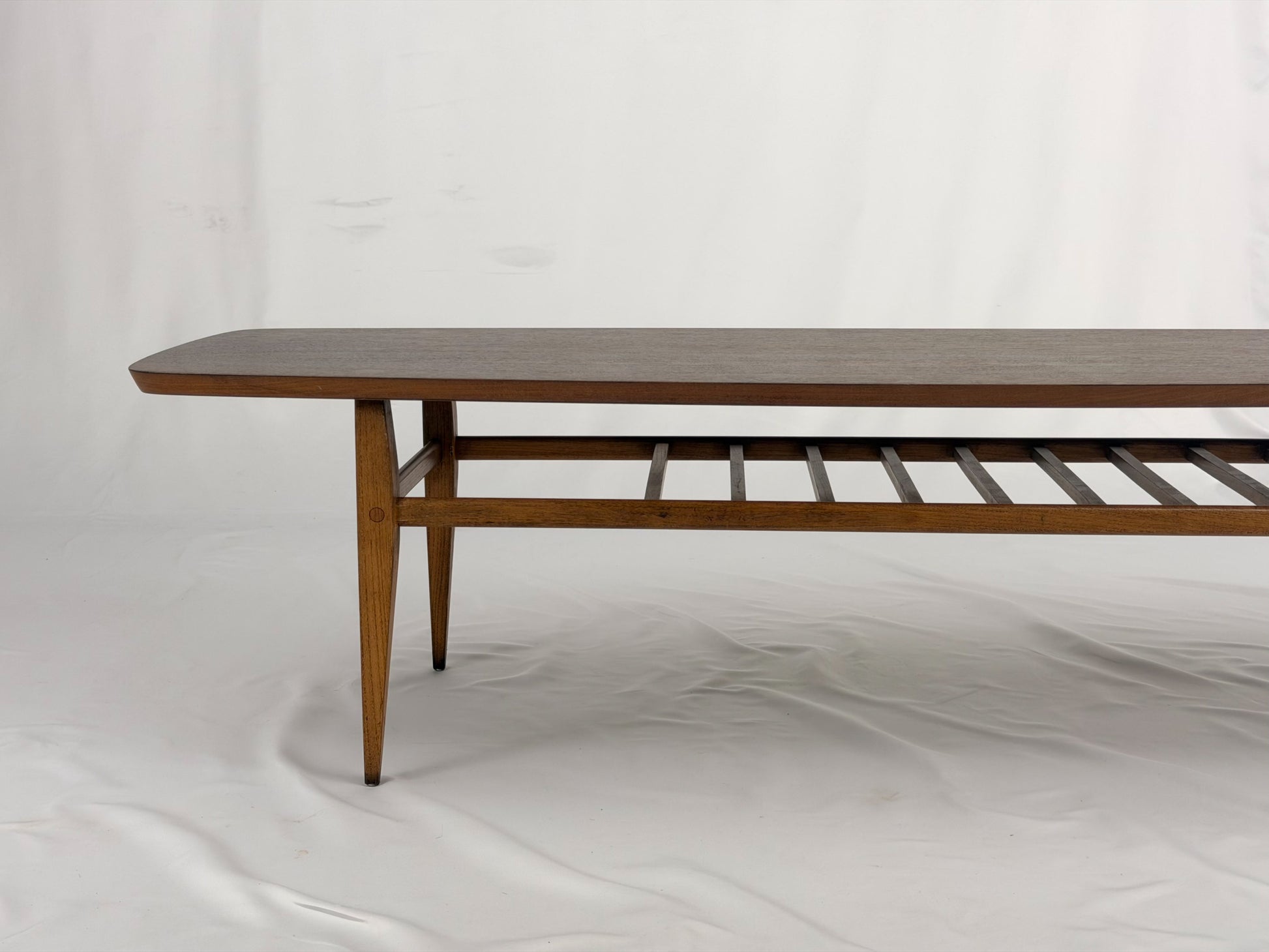 Wooden coffee table on a white background