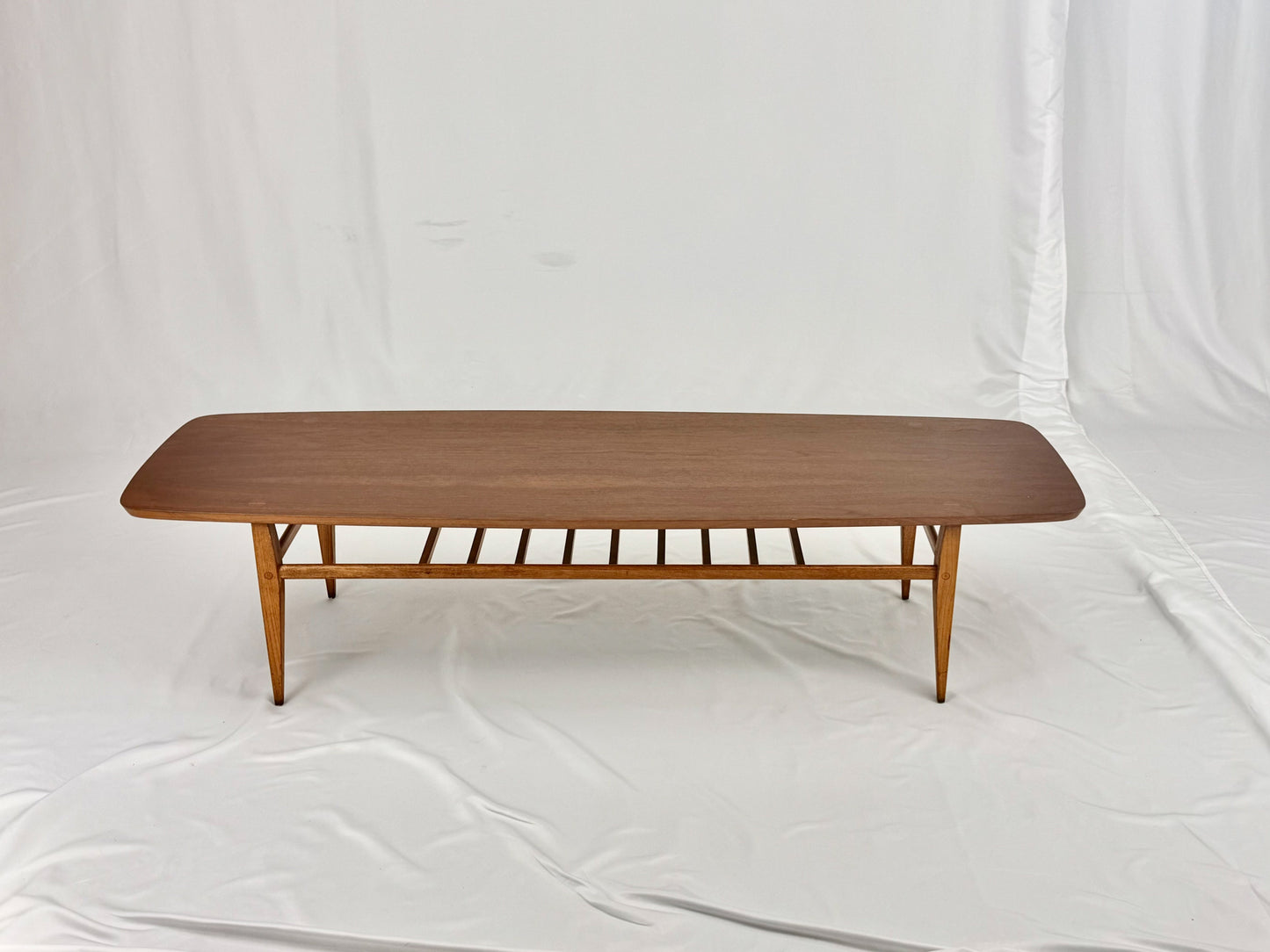 Wooden coffee table on a white background