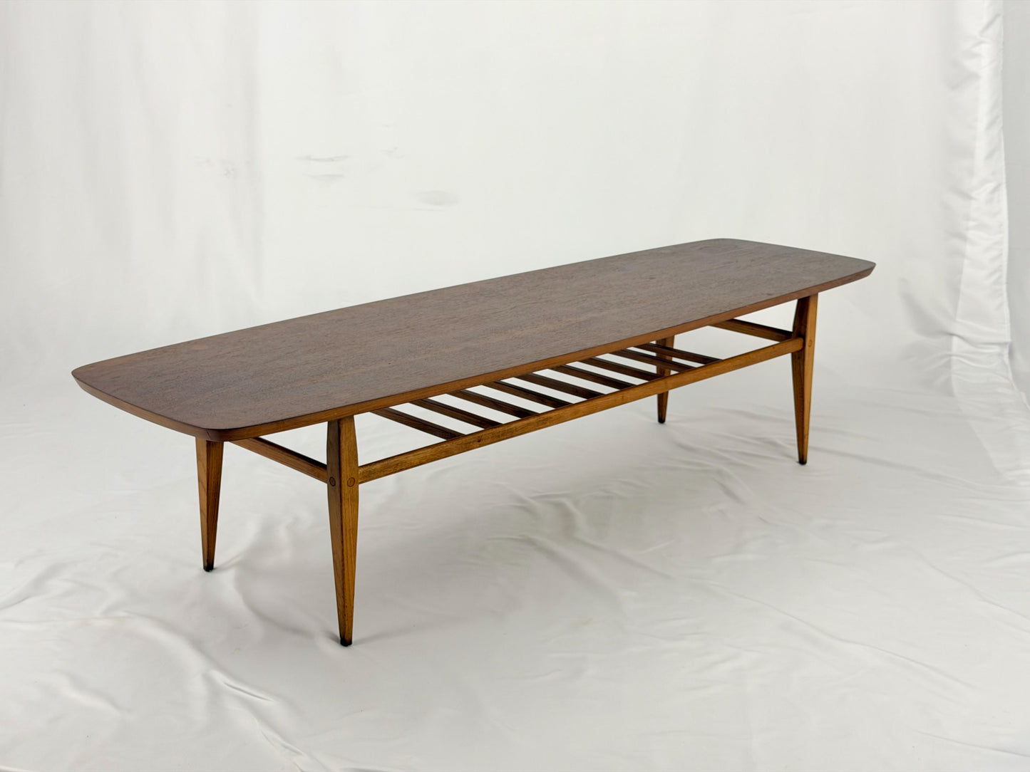 Wooden coffee table on a white background
