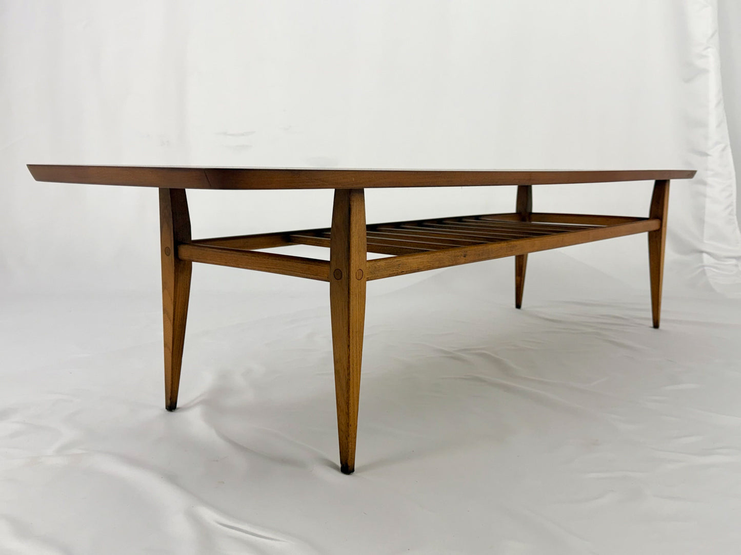Wooden coffee table on a white background