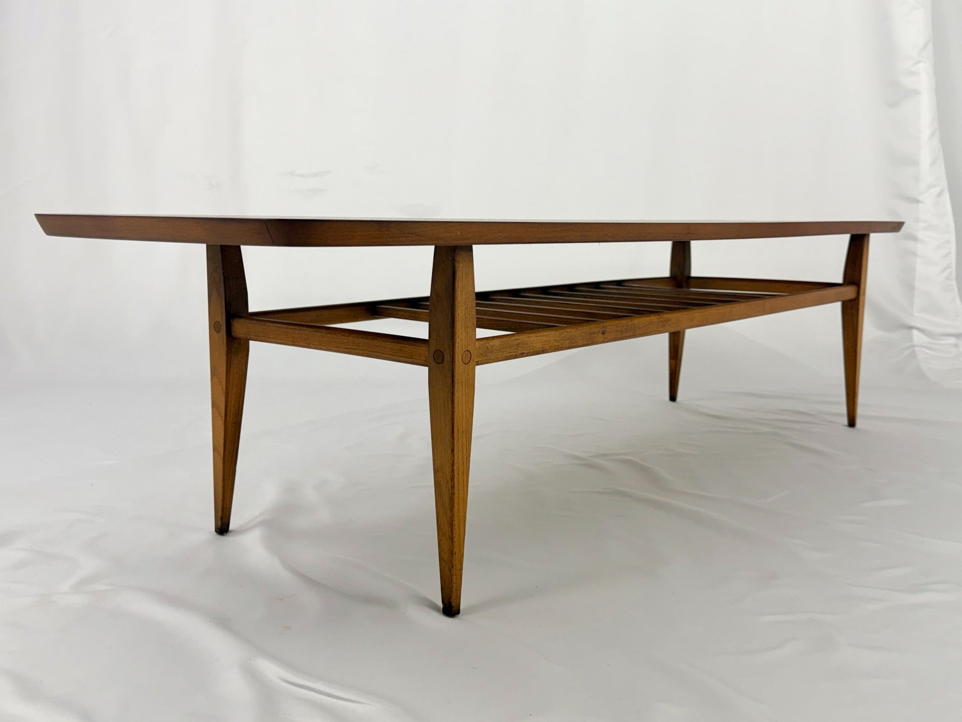 Wooden coffee table on a white background