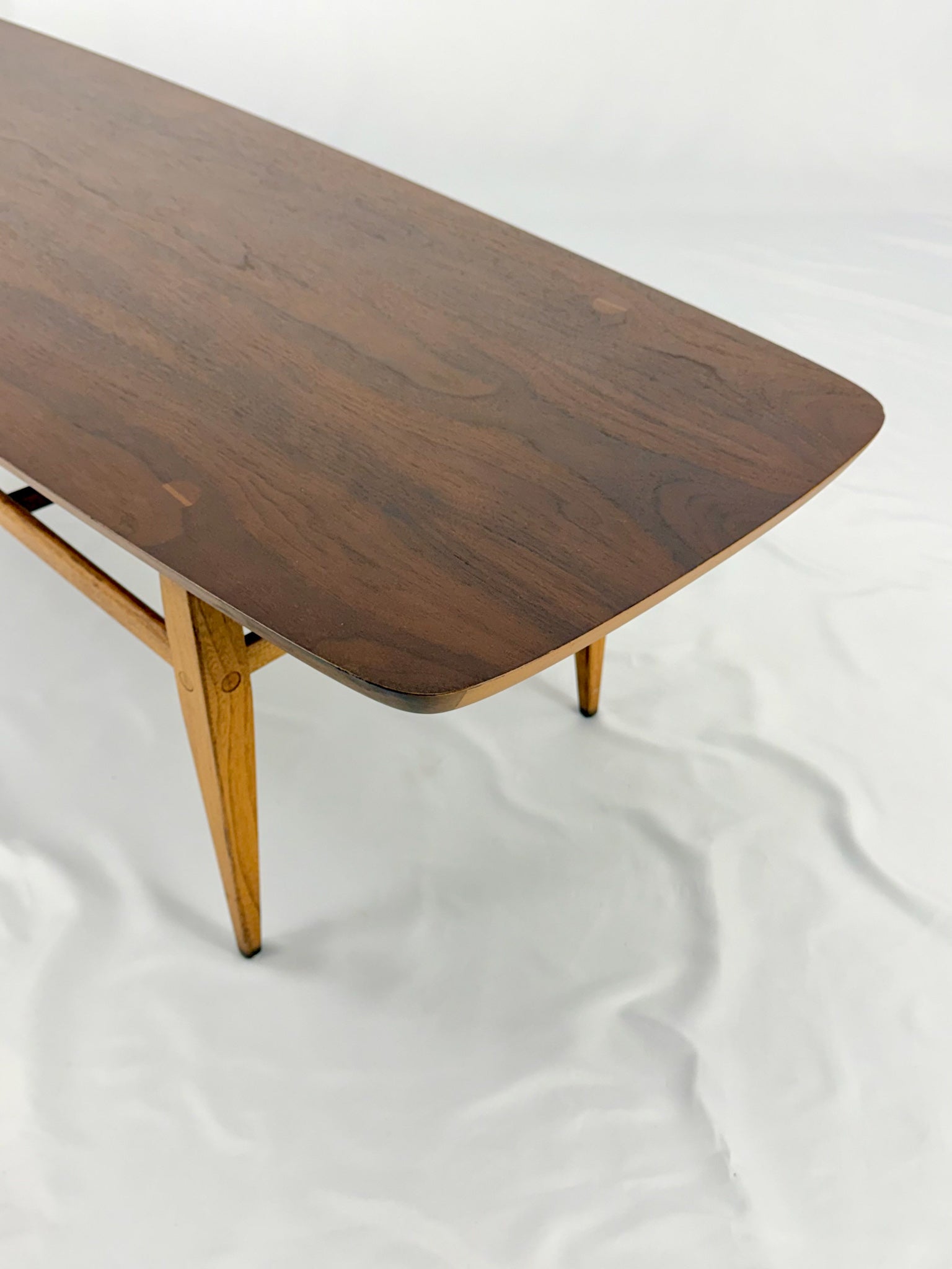 Wooden coffee table on a white background