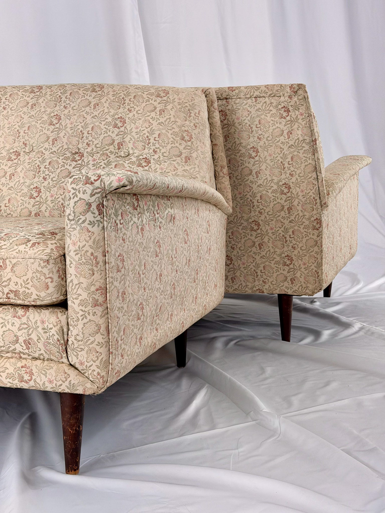 Beige sofa on a white background