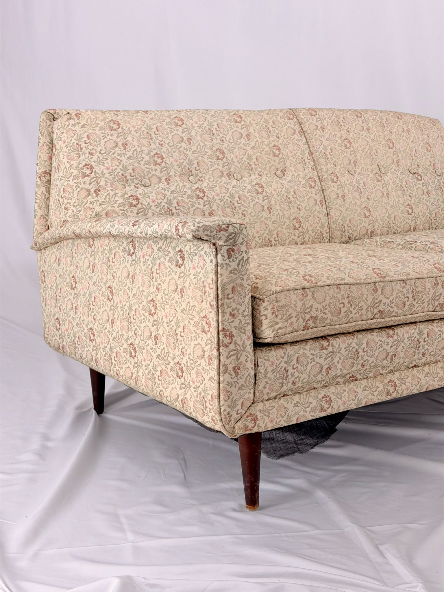 Beige sofa on a white background